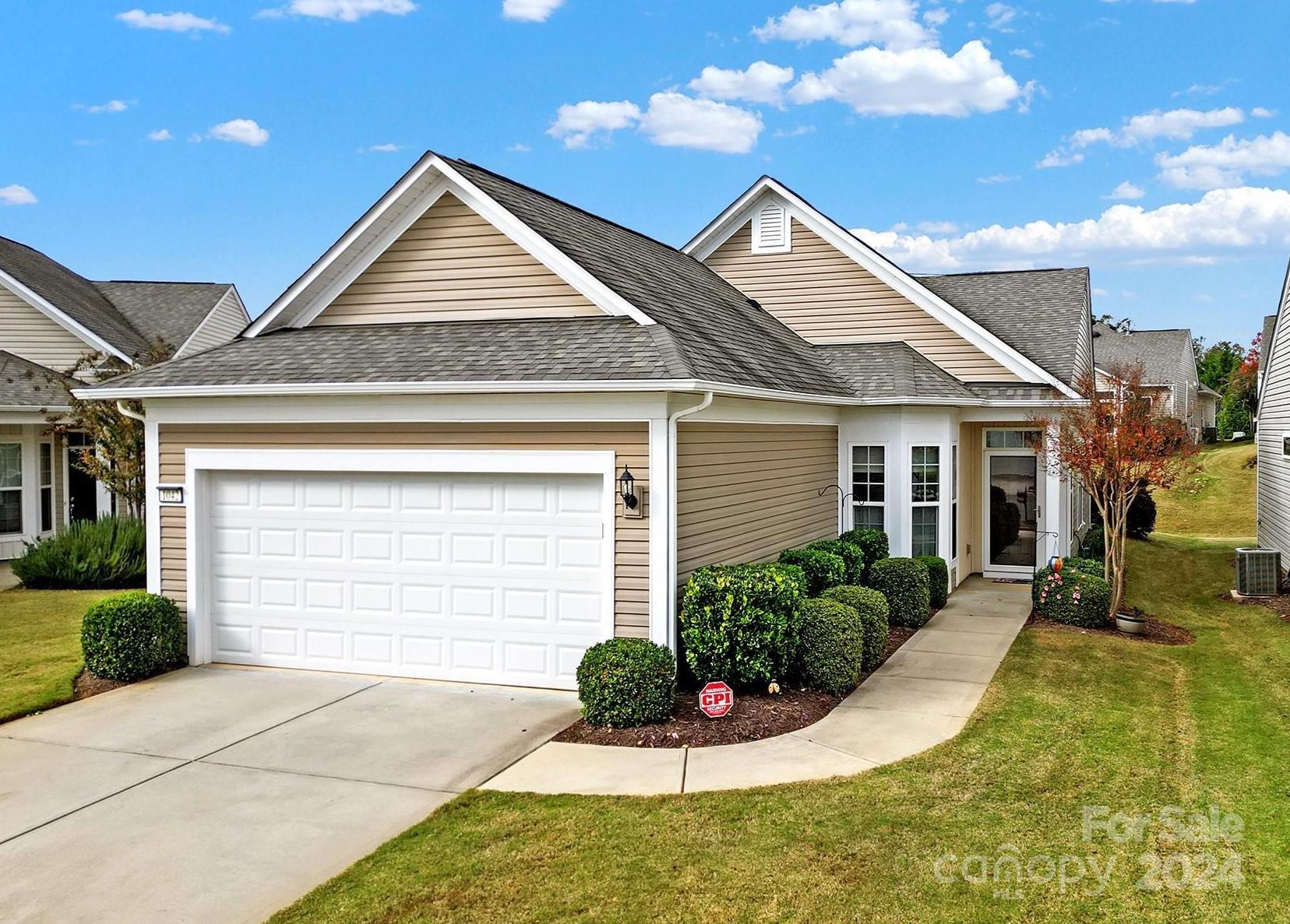 Well-maintained Gray Myst home on a cul-de-sac lot! Enjoy cooking meals in the eat-in kitchen, featuring engineered hardwood floors, granite counters, SS appliances, a pantry, and the sunny breakfast nook! Refrigerator, washer & dryer will convey with the home! A formal dining area sits off of the spacious great room with vinyl tile floors, a ceiling fan, & tons of natural light! The back doors opens to the covered patio, which is a great spot for relaxing or entertaining guests. At the rear of the home is the primary suite, offering a bathroom with dual sinks, tile floors, and a glass enclosed shower with tile accents! The office has French doors and makes the perfect home office or hobby room! This 55+ community offers resort-style amenities including an indoor & outdoor pool, tennis courts, pickleball courts, golf course, softball complex, fitness center, sidewalks & trails, and kayak/canoe access to Catawba River. Come make this home yours today!