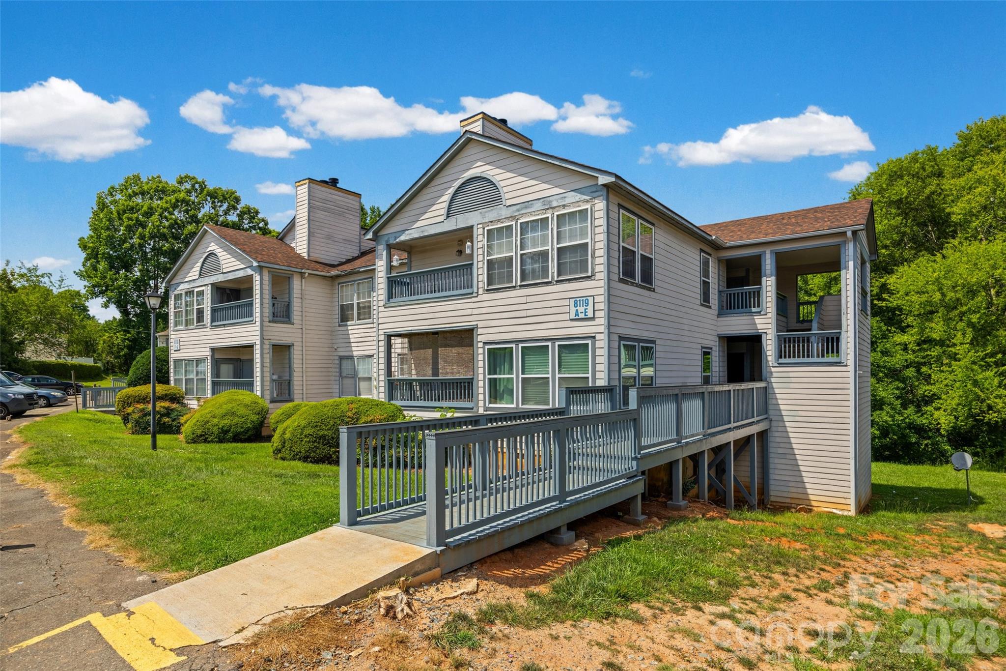 Welcome to this charming second-floor condo in Charlotte, offering an excellent opportunity for both homeowners and investors. This well-maintained unit features 1 bedroom, 1 full bathroom, and a versatile flex space that is perfect for a home office, guest area, or sitting room.  The living room is perfect for relaxing or entertaining. The adjacent dining area flows seamlessly into the kitchen, featuring a new electric range with oven, new dishwasher and new refrigerator, and provides a functional layout for everyday living. Laundry, with a new washer and dryer, is strategically placed off the kitchen in space that may also double as a kitchen pantry. Step outside to your private balcony, complete with convenient outdoor storage.  The spacious primary bedroom features a large walk-in closet with custom shelving and drawers, while the bathroom includes a full tub/shower combination, large vanity and linen closet. Recent updates include fresh interior paint (2025), new luxury vinyl plank flooring (Fall 2025), new windows (Fall 2025), updated light fixtures (Fall 2025), new kitchen and bathroom faucets (Fall 2025), and a new toilet (Fall 2025). The WiFi thermostat with doorbell camera is included.  Control your temperature comfort levels and view camera from your phone.  The HOA replaced the roof in 2022, offering added peace of mind.  Residents enjoy access to community amenities, including both an all-inclusive pool and an adult only pool. Just approximately a 15-20 minute drive to Uptown Charlotte and conveniently located near shopping, dining, and major commuting routes, this move-in-ready condo is a fantastic place to call home or add to your investment portfolio.  Opportunities such as this don't come around very often.  Don't miss out!
