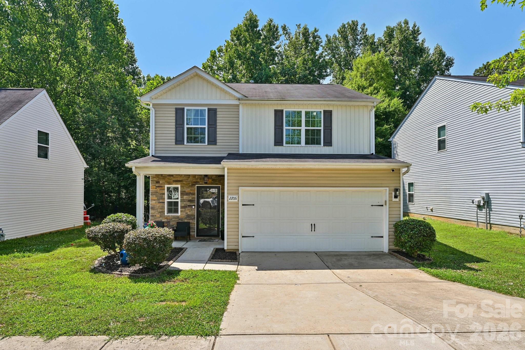Welcome home to this beautifully designed 3-bedroom, 2.5-bathroom home featuring a bright, open-concept floor plan that's perfect for both everyday living and entertaining. Abundant natural light fills the main level, highlighting the stunning dark hardwood floors that flow throughout the downstairs and perfectly complement the rich dark wood cabinetry in the kitchen.

At the heart of the home, the spacious kitchen offers a large center island with a breakfast bar, creating the ideal gathering space for meals, conversations, and entertaining. The seamless flow between the kitchen, dining, and living areas keeps everyone connected while providing plenty of room to spread out.

Upstairs, a versatile loft offers additional living space that's perfect for a media room, home office, or play area. The expansive primary suite is a true retreat, featuring elegant tray ceilings, a generously sized bedroom with room for oversized furniture, and a spacious walk-in closet. Two additional bedrooms and a full bath provide comfortable accommodations for family or guests.

Step outside to enjoy the rear patio, offering the perfect spot for morning coffee, outdoor dining, or relaxing at the end of the day. With its spacious layout, thoughtful updates, and inviting design, this home is ready for its next owner to enjoy!