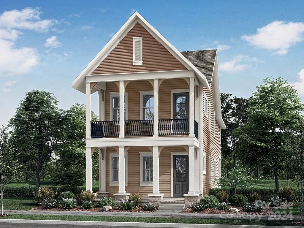 New home under construction in Fort Mill with a Spring completion. This charming Cottage is conveniently located in Springfield Town Center where you can enjoy walking to local area restaurants, shops and the Harris Teeter. Features on the main level include open living with the family room leading into a beautiful kitchen with stacked cabinets and a large center island. The two car detached garage leads to a beautiful covered rear porch perfect for entertaining and two great front porches overlooking Promenade Park, this green space will be the heart of the community. The upper level features a spacious primary suite with luxurious bath and walk-in closet plus two secondary bedrooms each with their own walk-in closest and an additional full bath. You don't want to miss this opportunity to own a brand new home in Fort Mill!