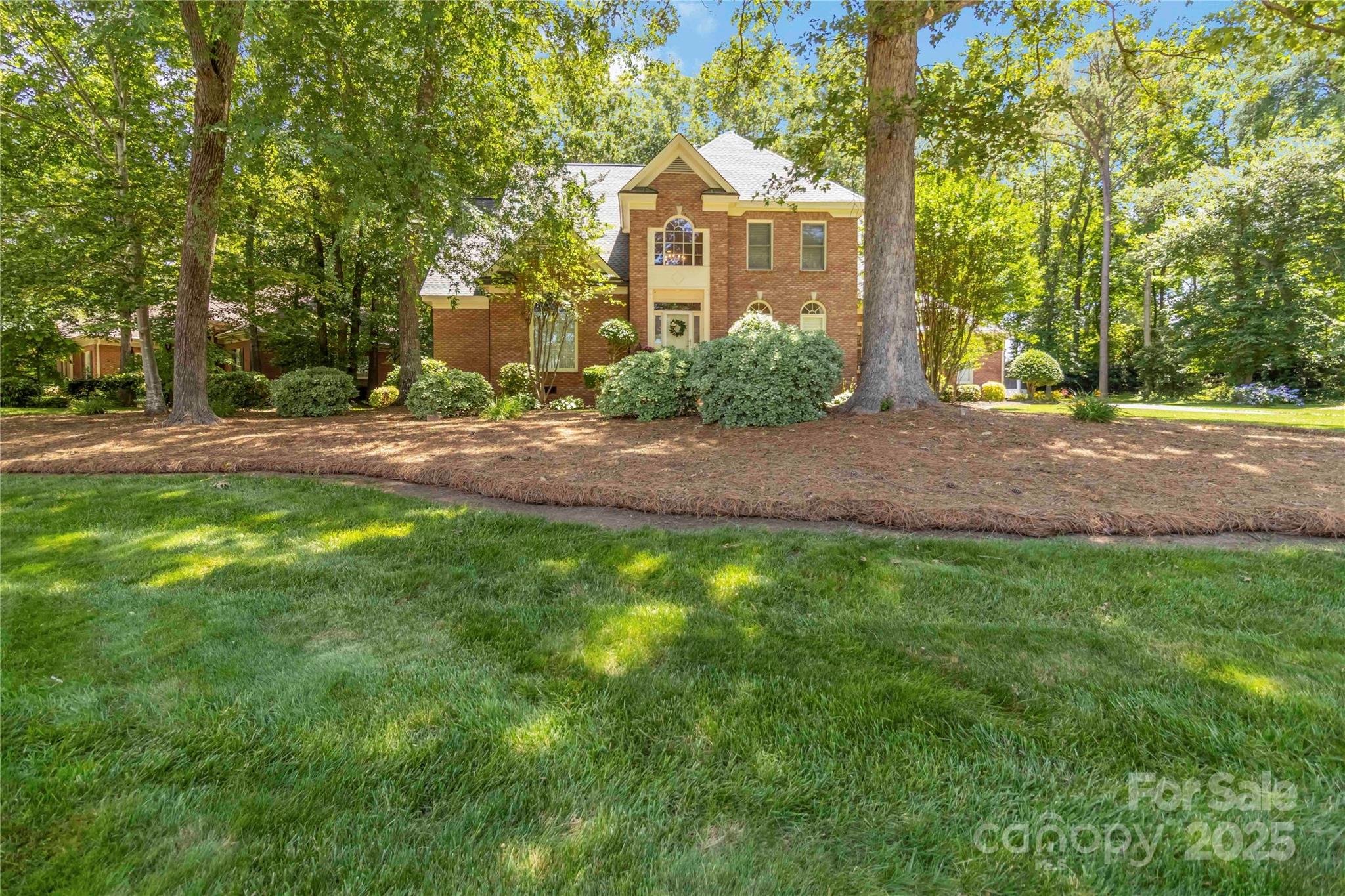 Sellers offering $5,000 in concessions with an acceptable offer. 
This stately home offers ample space for family gatherings and entertaining. It features a primary suite on the main floor and three additional bedrooms upstairs.
The large kitchen boasts an island, double oven, and plenty of storage. The living room is highlighted by a fireplace, built-in shelving, and a wet bar. The master bedroom has French doors that open to a large back deck, complete with a jetted tub, walk-in shower, and a spacious vanity. The outdoor spaces are perfect for entertaining, with a 41x15 deck that includes a covered grilling area and TV mounts, as well as a covered 20x25 patio with another fireplace and additional TV mounts. The large backyard, two-car garage, and new roof complete this exceptional property.