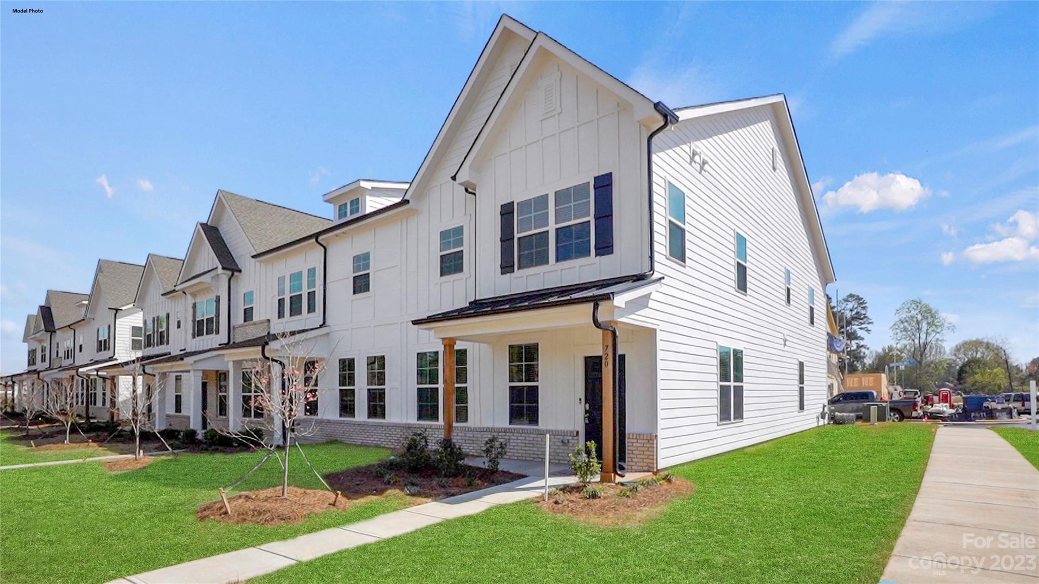 AVAILABLE NOW! Fabulous location!! Close to shopping, dining & quick I-77 access to Charlotte.  This 1763 SF luxury townhouse boasts 9 foot ceilings, 3 bedrooms, 2.5 baths, open concept kitchen overlooking the dining & great room.  Primary suite featuring an oversized tile shower with bench, double sinks, 2 walk-in closets, trey ceiling & seating area. Both guest bedrooms have walk in closets. Kitchen features Stainless appliances, large pantry, 5 burner gas range with convection/air fryer oven, tile backsplash & granite countertops. Laundry room with room for folding table & more.  Oversized rearload 2 car garage with 2 car driveway. So many upgrades in every home! Lucca white interior design package. Gorgeous HOA maintained lawn for carefree lifestyle & community park for outdoor fun. End of building home with extra windows & oversized side yard.