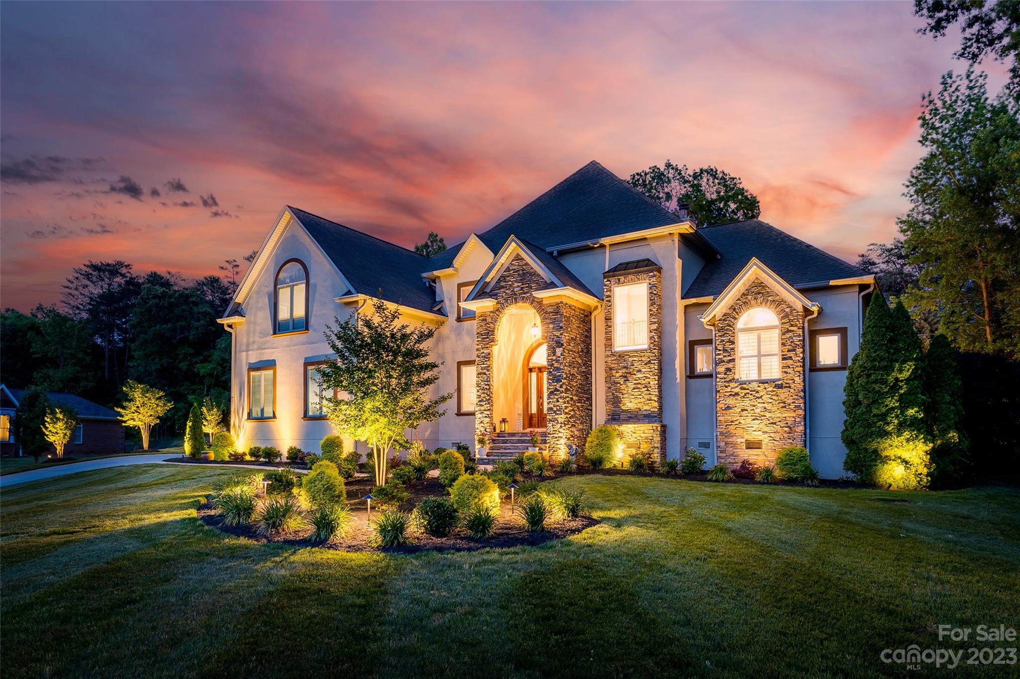 Updated custom home on large private lot in quaint Spring Branch subdivision of Fort Mill. Main level features large open kitchen; primary suite w/ access to patio & pool; expansive great room w/ wood burning fireplace; beautiful views of the backyard oasis; office & half bath w/ outdoor pool access for guests. Main level also includes additional dining area & den with gas logs. Upstairs features a large loft, bonus room & 3 additional bedrooms all with full baths. Updates to HVAC, vapor barrier, saltwater pool system, and more!