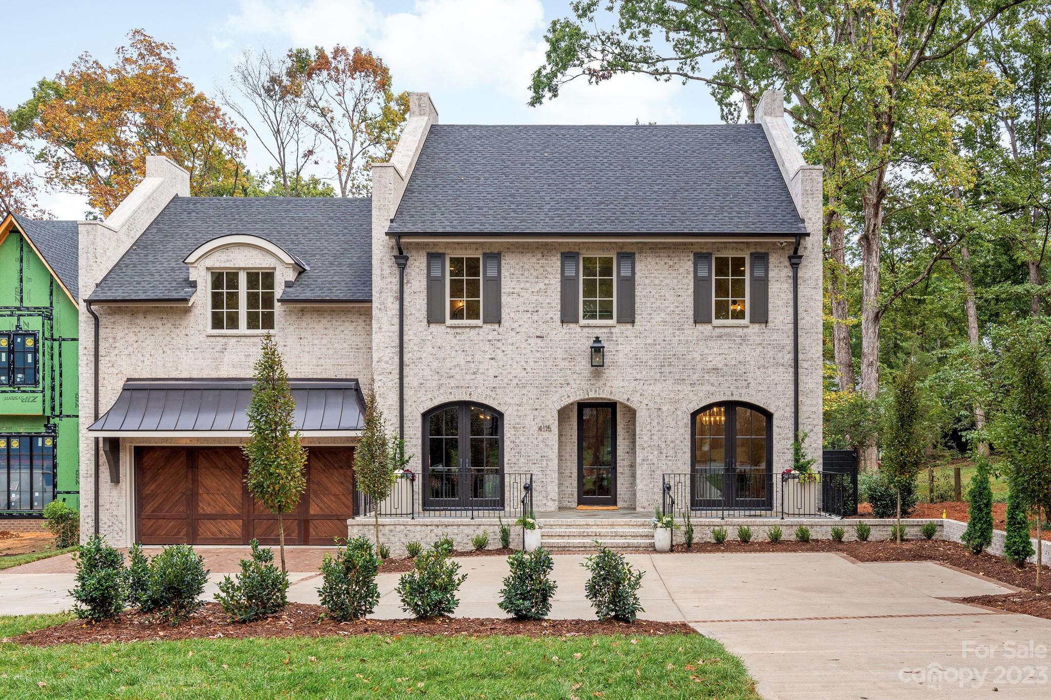 Start making memories in this stunning Cotswold new construction home built by THR Design Build.  Luxury custom finishes greet you as you step inside this entertainer's dream home: 48' Wolf range w/ custom hood, 42" SubZero frig, and large custom cabinetry island.  Tucked away in the spacious Butler’s Pantry is a Thermador wine tower, ice maker, 2nd frig, and 2nd dishwasher.   Open the accordion glass doors as you relax by the fire in the Great Room.  Enjoy the fresh air with indoor/outdoor living from the back porch overlooking the beautiful custom pool and spa! Main level Primary suite is full of light with a luxurious spa bathroom and custom closet with stackable washer/dryer.  Formal dining room, study, breakfast room, and mud round out the main level. Upstairs you will find 5 additional bedrooms, laundry, and generous bonus room.  Beautiful white oak hardwoods throughout.  Plenty of parking with a 2-car attached garage, formal front motor court and circular driveway. Welcome home!