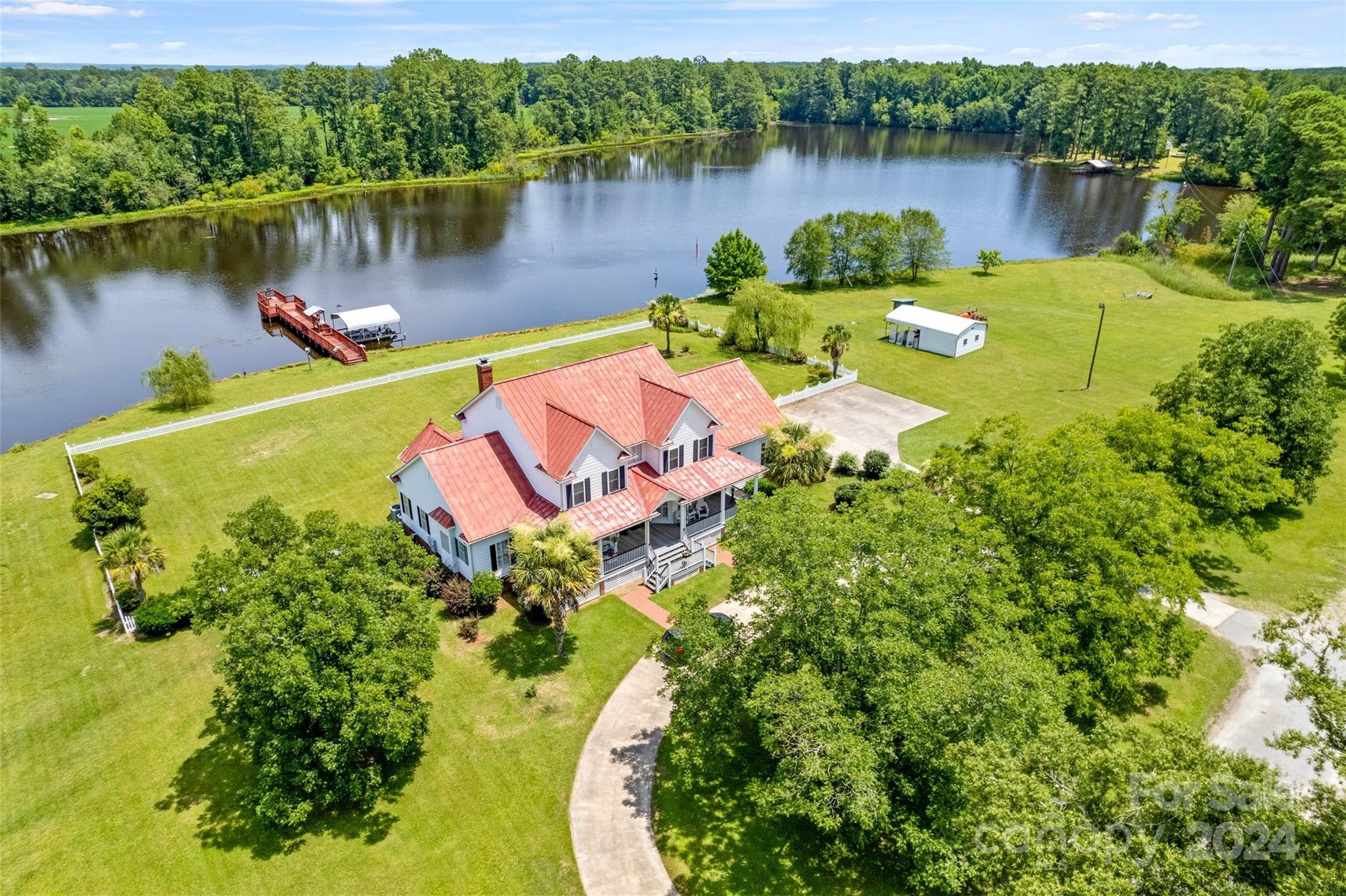 BACK ON MARKET! Looking for a home that boasts Southern Charm? This is it! Owners use the large bonus room as a 4TH BEDROOM! Home has a full length rocking chair front porch, screened in back porch, and salt water pool for those relaxing moments of leisure. True heart of pine hardwood flooring throughout the home makes you feel the warmth of home when walking into this Southern Paradise! The lot is stunning especially when sitting on the back screened in porch over looking the 18 acre pond. The pond is fully stocked with bass, crappie, and brim. There is a pecan orchard, pear, peach, fig, persimmon trees, not to exclude grape vines on the property. It is a true retreat on 8.75 acres. There is an outdoor storage building along with a work shop room that will be great for storage. Work shop would be a great pool room as well. Cheraw is located a little over 1.5 hours from the beach and offers that small town feel full of amazing history and that feeling that makes you feel right at home.