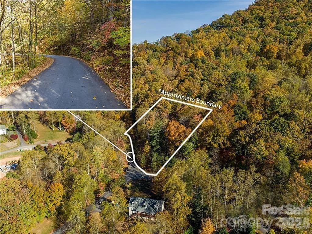 Tucked-away gem with mountain views! Nestled in an established, upscale community just 20 minutes from vibrant downtown Asheville. This beautiful parcel offers privacy, peaceful surroundings, and lovely vistas throughout the neighborhood. Enjoy the charm of well-maintained common areas, including a gazebo perfect for relaxing or entertaining. Located close to fine dining, boutique shopping, world-class hiking, and everything the area has to offer. Old 3-bedroom improvement permit on file—property perked for a 3-bedroom home in 2006 (buyer to verify). A rare opportunity to build your dream home in a serene yet convenient setting!