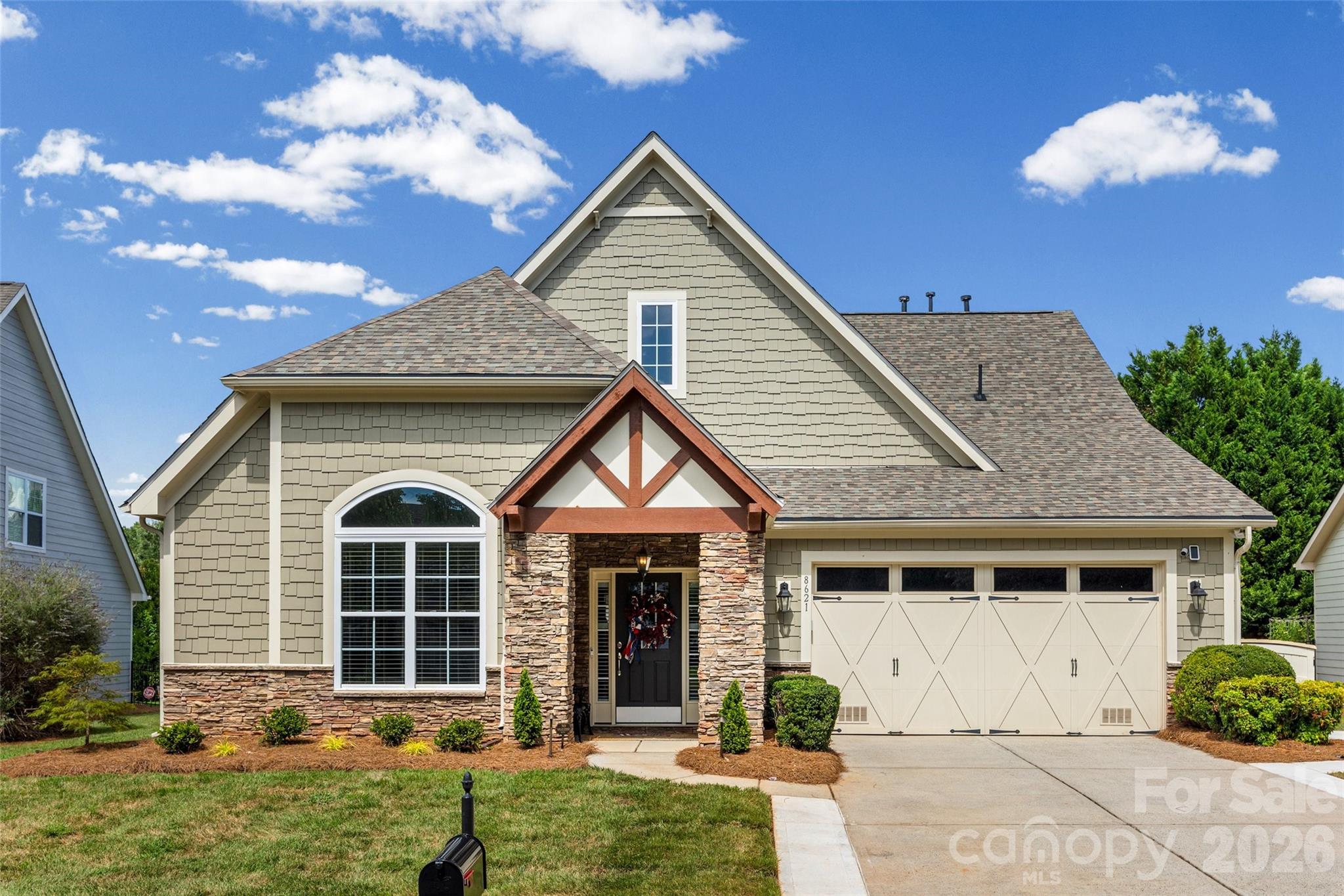 Welcome to The Vineyards on Lake Wylie, or should I say, WELCOME HOME!!!  This is where resort-style living and everyday comfort come together in one of the area’s most desirable communities.

Located in the coveted Napa section of The Vineyards, this beautifully updated 4-bedroom, 3-bath home has all the space and upgrades you’ve been looking for. The open floor plan is perfect for entertaining, with a spacious two-story great room that flows right into the stunning kitchen.  The great room features built-ins and a cozy gas fireplace  Renovated in 2022, the updated kitchen offers tall custom cabinets, beautiful countertops, a stylish backsplash, gas range, and a large center island that’s made for gathering with family and friends.

The primary suite is tucked away on the main level and feels like its own private getaway, complete with a HUGE, custom walk-in closet, and fully renovated ensuite boasting dual vanities and a beautifully updated walk-in tile shower with contrasting floor and niche. You’ll also find a dedicated home office tucked behind double French doors, an additional bedroom, and a full bath downstairs, giving you plenty of flexibility for guests, working from home, or multigenerational living.  The spacious laundry room rounds out the downstairs space.

Upstairs features two more spacious bedrooms, including a guest suite with its own attached bath and a gigantic, climate controlled storage closet, plus a loft that’s perfect for a media room, playroom, or second living space. 

The list of updates is impressive: new hardwood floors downstairs, fresh interior paint, a new roof, tankless water heater, custom garage cabinets, an extended driveway, and professionally updated landscaping with beautiful uplighting, all done in 2025, and two new HVAC systems in 2022. Even better—there’s no carpet anywhere in the home.

Step outside and enjoy your own backyard retreat. The screened porch overlooks an extended paver patio complete with a built-in outdoor kitchen, featuring a grill, a Big Green Egg, and a s/s mini fridge, making it the perfect place to relax or entertain all year long.  Patio furniture and umbrella will convey with the home.

Living in The Vineyards on Lake Wylie means you’ll enjoy resort-style amenities, lake access to beautiful Lake Wylie, a private marina plus dry storage for your boat, trailer and/or RV, boat ramp, lakeside boardwalk, kayak and canoe storage racks, walking trails, playground, picnic pavilion, dog park, tennis, pickleball and bocce courts, a brand new full feature club house complete with two amazing pools, a fitness center, plus a whole lot more, and plenty of opportunities to enjoy the outdoors.

This is the kind of home that has been thoughtfully updated, meticulously maintained, and is truly move-in ready. All that’s missing is you!

HOA fees include lawn maintenance, cable, internet and garbage.  Seller will provide a one-year home warranty and separate sod maintenance (overseeding) in the Fall.