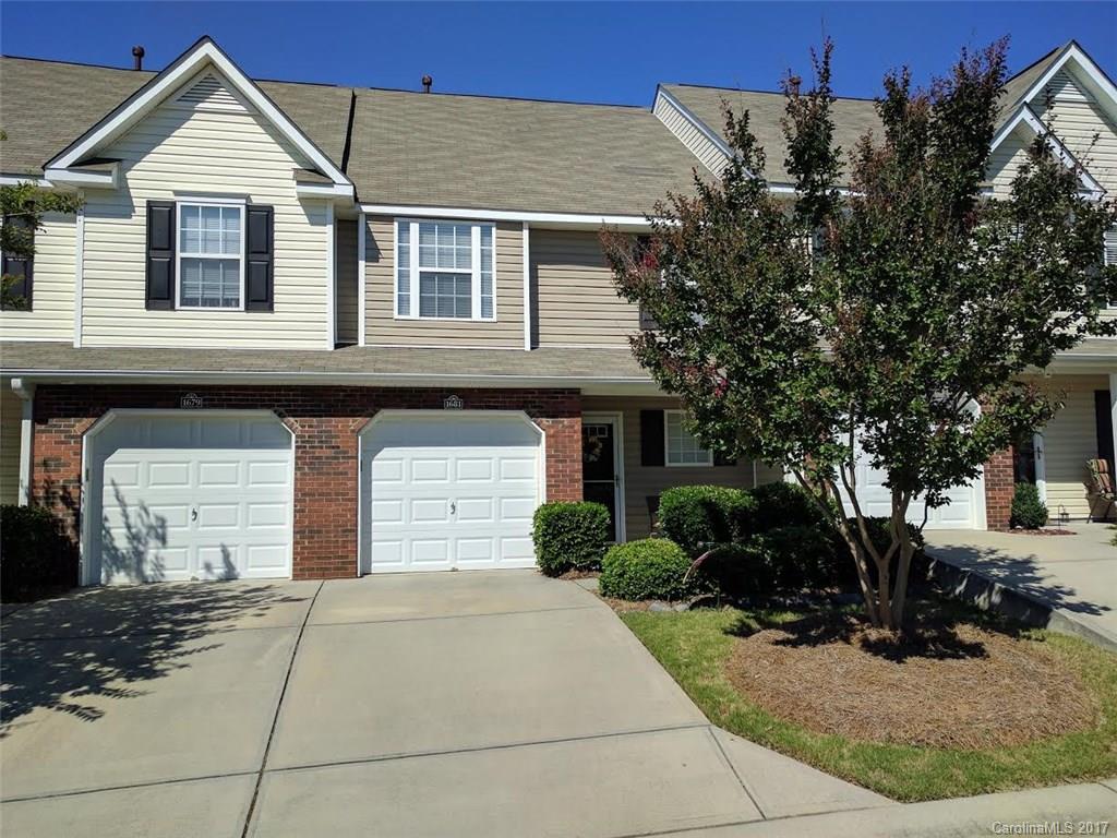 Welcome home to this move in ready townhouse featuring two masters, hardwood floors, laminate flooring, 2017 HVAC, 1 car garage, and more! Kick back and relax on the back patio, take a stroll through the neighborhood with sidewalks throughout, or take a dip in the beautiful community pool! This home is convenient to everything - about a 25 minute drive to Charlotte, 5 minute drive to Riverwalk, and 2 minute drive to a local farmer's market!