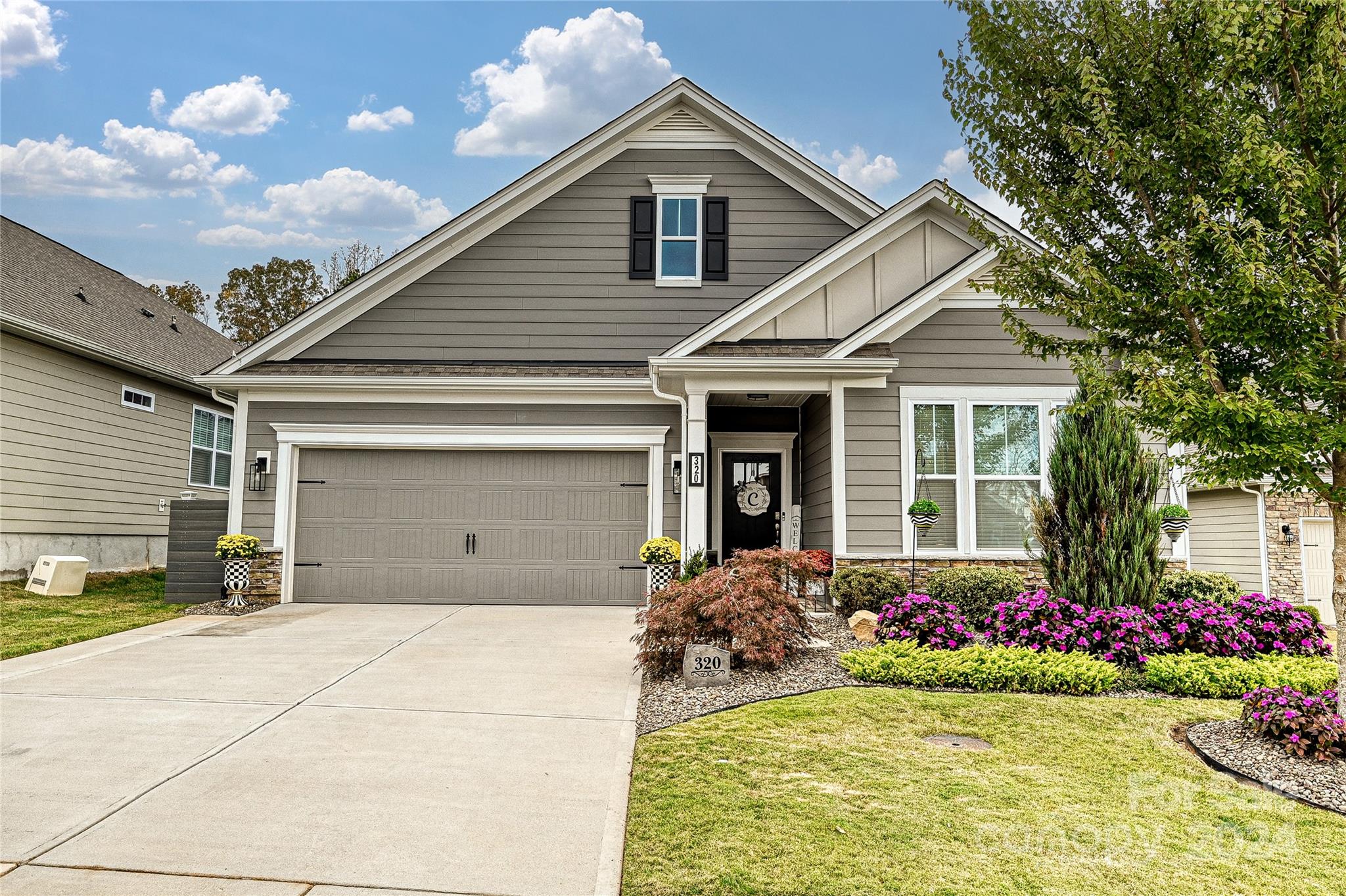 Upgrades galore! Gorgeous ranch on cul-de-sac in desirable subdivision with HOA provided lawncare close to Denver, Charlotte and Lake Norman. 3-year-old home has been meticulously maintained and upgraded. All new lighting, hardware, custom pantry and laundry room. 2 Walk-in custom closets in the primary. Kitchen w/island, gas range, granite counters, tile backsplash, s/s appliances. Open living and dining space includes gas fireplace w/wood accent wall. Large primary suite has accent wall, frameless shower, dual sinks. Flex room w/French doors could be 3rd bedroom. LVP throughout—no carpet. Garage has floor covering & pull-down stairs to attic w/flooring for storage. Outdoor retreat features a covered porch, extended patio, gorgeous landscaping plus a shed for extra storage. Tankless water heater, smart home. Community pool, clubhouse, fitness center, playground. Minutes from shops, grocery stores, restaurants. Lending Incentives available with preferred lender. Truly one-of-a-kind!
