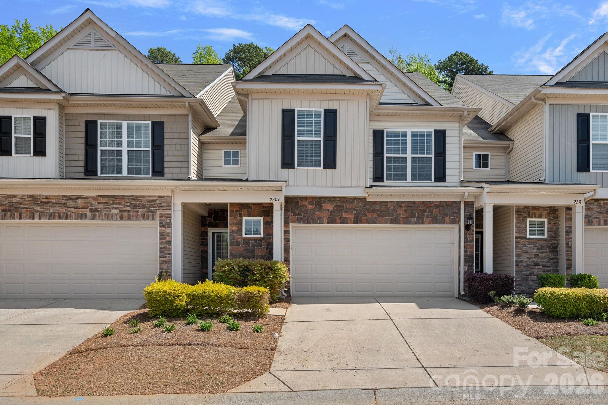 Perfectly positioned just minutes from SouthPark’s premier shopping, dining, and everyday conveniences—and only 10 minutes from Uptown with easy access to the greenway—this beautifully updated 3-bedroom, 2.5-bath townhome offers an exceptional blend of comfort, style, and unbeatable location.
Step inside to a warm, inviting interior where thoughtful upgrades shine at every turn. Rich hardwood floors flow seamlessly throughout the main living areas, complemented by sleek quartz countertops, a designer backsplash, and custom wooden shelving in the pantry and primary closets. The kitchen has been tastefully refreshed with a new sink and faucet, while the primary bath features an upgraded sink, mirrors, and modern fixtures for a polished, cohesive feel. New lighting and ceiling fans throughout enhance both ambiance and functionality, and a new storm door creates an inviting first impression. Even the garage has been elevated with freshly painted walls—reflecting the meticulous care given to every detail.

The open-concept layout, paired with soaring vaulted ceilings, fills the home with natural light and creates a bright, airy atmosphere—perfect for both everyday living and effortless entertaining.

Upstairs, retreat to a tranquil primary suite privately tucked at the rear of the home, highlighted by an elegant trey ceiling. A dedicated workspace offers the ideal setup for remote work or quiet study, while two additional bedrooms and a well-appointed laundry room with new cabinetry provide flexibility for family, guests, or hobbies.

Enjoy the best of both worlds—just a short stroll to the community’s exceptional amenities, yet peacefully set back from the hustle and bustle. Residents enjoy access to a clubhouse, resort-style pool, fitness center, playground, and dog park—everything you need to relax, recharge, and feel right at home.

Extensive upgrades include a stunning new kitchen backsplash and quartz countertops, custom wooden pantry shelving, a stylish dining area feature wall, and an upgraded fireplace surround and mantle. Additional enhancements include new light fixtures and ceiling fans throughout, a chic half-bath vanity, plush new carpeting on the stairs and second level, custom wood shelving in the primary walk-in closet, a quartz-topped primary vanity, added laundry room cabinetry, a storm door, and a fully painted garage—every detail thoughtfully curated for modern living.