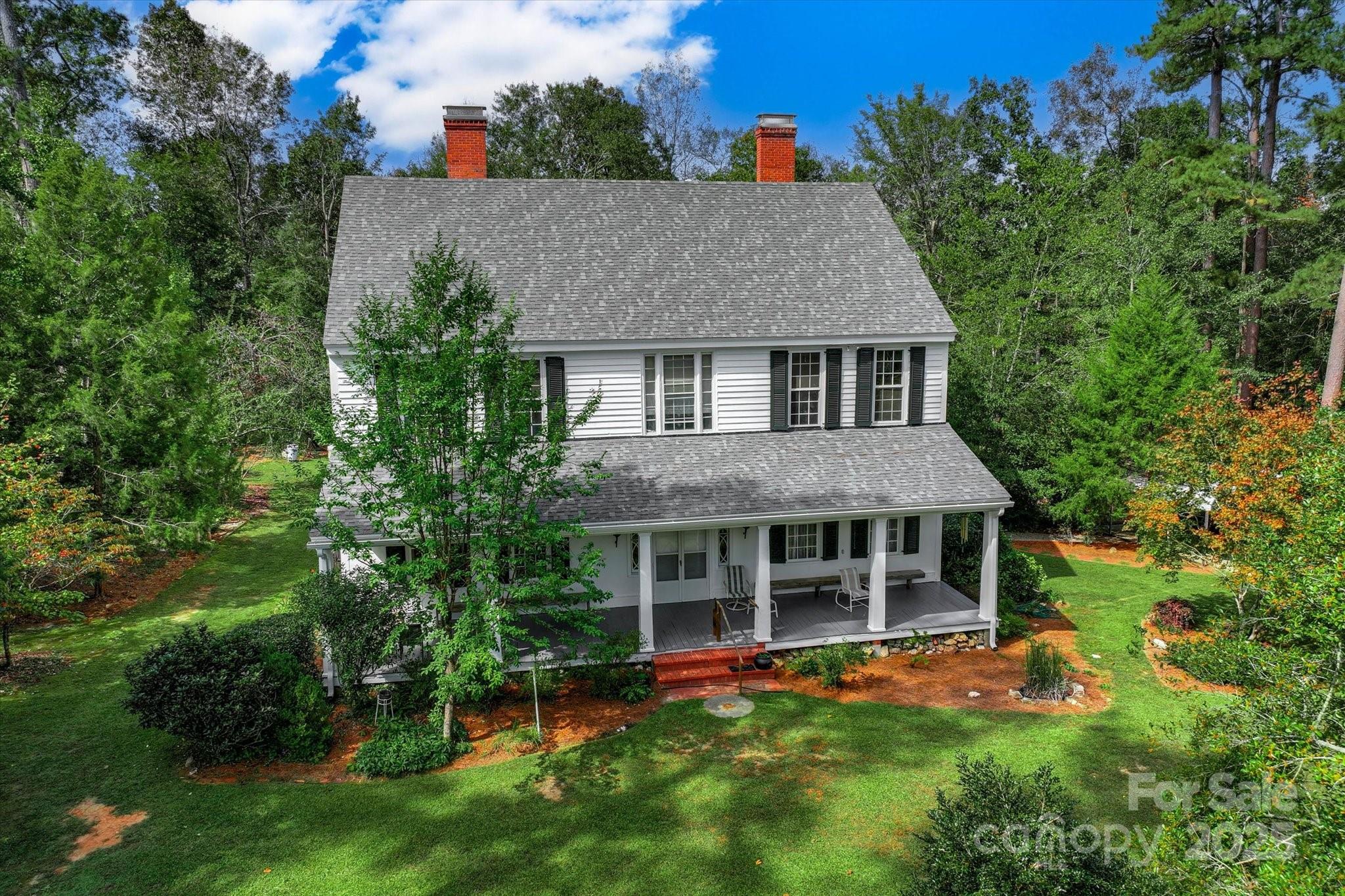 Historic Simkins/Tompkins Hous A Legacy Reimagined Step into South Carolina history with this stunning 14 room, three story estate, originally built by Revolutionary War patriot and a founder of Edgefield, Col. Arthur Simkins, in the late 1700's. Reconstructed in the 1830's using original heart of pine timbers and hand crafted details. -- including a carved archway and hand forged nails -- this home blends timeless craftsmanship with modern comfort. Set on a serine tract of almost 30 acres along Meeting Street Road overlooking Turkey Creek, the property features wide porches, soaring halls, a grand staircase, and architectural elements originally from other iconic Edgefield homes. Once the center piece of Cedar Fields Plantation and later a gathering place for the Edgefield Light Dragoons, its walls echo with stories of early American independence, Southern tradition and generations of family life. Now thoughtfully updated with a new roof, a freshly hand painted exterior and a whole house generator, this historic treasure awaits its next chapter. Own a piece of Edgefield soul. -- where heritage meets home.