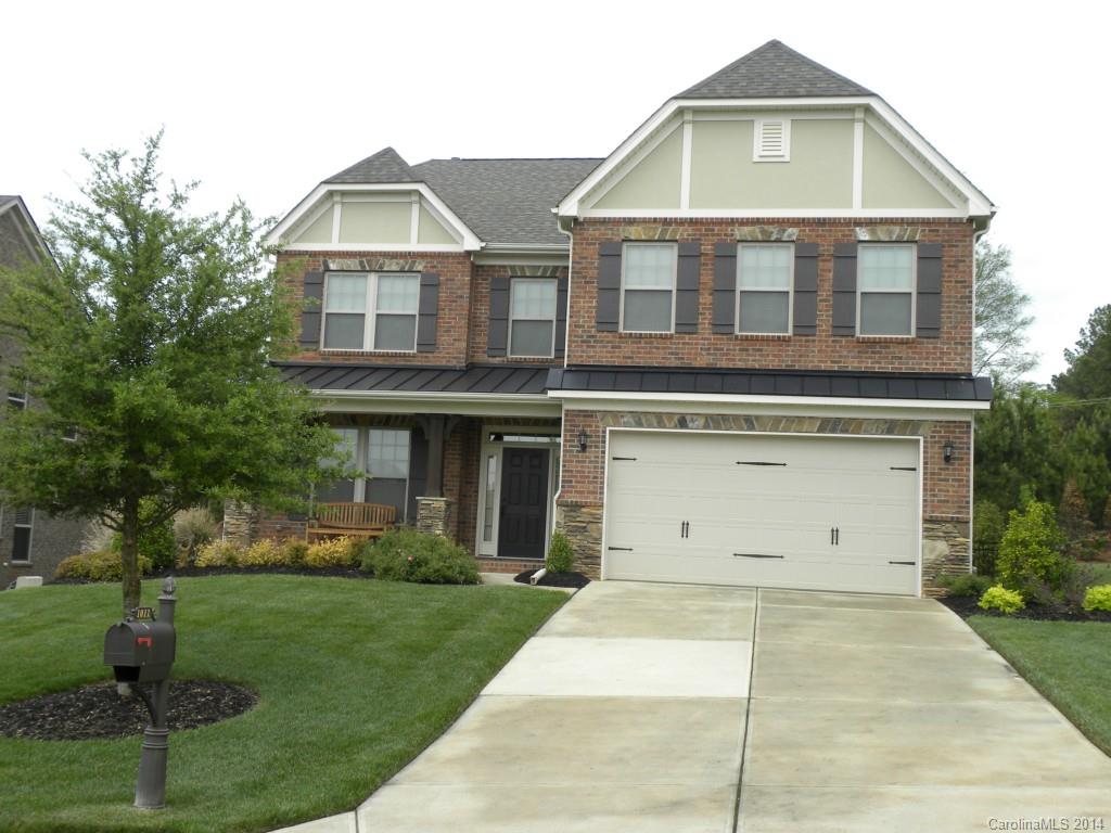 All brick 2 story Tudor with guest room/office on main level.  Hardwood floors throughout main level, tile bathrooms, gourmet kitchen with granite, gas cooktop and stainless steel appliances,  crown molding throughout.  Beautiful stone patio with nice size backyard.  A must see and move in ready.