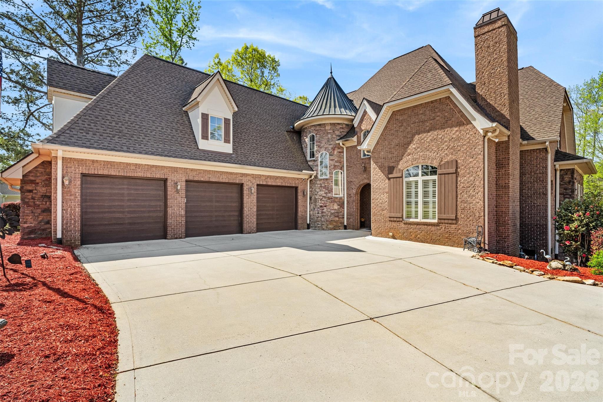 INDIAN LAND,INDIAN LAND,INDIAN LAND! Millstone Creek is conveniently located just across Hwy 521 from the Indian Land High School making those early mornings easy for your student. Welcome to a truly exceptional estate where luxury, craftsmanship, and peace of mind come together seamlessly. Perfectly positioned on a private 1-acre homesite, this impressive 5,300 square foot residence has undergone an extensive, top-to-bottom transformation—offering the rare opportunity to own a home that lives like new while delivering timeless architectural character.
From the moment you arrive, the property’s presence is undeniable. Mature trees have been thoughtfully cleared to enhance both curb appeal and natural light, while upgraded driveway lighting and meticulous drainage improvements ensure both beauty and functionality. Inside, the entire home has been freshly painted, creating a clean, sophisticated canvas that complements any style.
Designed for both comfort and convenience, the home features a private elevator, effortlessly connecting all levels—ideal for multi-generational living or simply elevating everyday ease.
At the heart of the home lies a completely reimagined chef’s kitchen, outfitted with high-end appliances including a premium gas range, designer refrigerator, new countertops, an expansive island, custom-finished cabinetry, and a striking backsplash. Every detail has been curated to blend elegance with performance.
The bathrooms have been fully refreshed with modern fixtures, updated lighting, new countertops, mirrors, and toilets, while the luxurious primary suite showcases a completely rebuilt walk-in shower—creating a spa-like retreat.
Beyond aesthetics, this home offers unmatched structural and mechanical upgrades for long-term confidence. A brand-new roof with enhanced flashing and metal accents, encapsulated crawlspace with dehumidifier, new insulation, vapor barrier, and reinforced structural elements ensure efficiency and durability. The well system has been fully modernized, and an advanced irrigation system with 60 new sprinkler heads and rain detection keeps the grounds lush year-round.
Step outside to discover a true resort-style outdoor retreat. The backyard is anchored by a fully rebuilt resort-style pool and spa, complemented by an inviting cabana—creating the ultimate setting for relaxation and entertaining. A newly constructed pavilion with fans, lighting, and a wood-burning fireplace enhances the experience, while the enclosed sunroom offers year-round enjoyment overlooking these beautifully designed outdoor living spaces. The pool deck has been completely replaced with temperature-sensitive finishes, and all surrounding drainage has been thoughtfully engineered for long-term performance.
Car enthusiasts, hobbyists, and those needing extra storage will appreciate the exceptional garage setup. The home features an oversized 3-car attached garage with new motors and battery backups, along with a separate 4th garage at the rear of the property—perfect for lawn equipment, tools, a workshop, or additional storage.
Additional highlights include:
• Fully sealed and insulated garage spaces with new doors, motors, and battery backups
• Comprehensive security system with cameras and smart features
• New LED lighting throughout the property, including exterior and driveway illumination
• New gutters and drainage systems directing water safely away from the home
• Finished and insulated attic spaces adding usable square footage and efficiency
• New fencing enclosing the pool area for privacy and safety

Every inch of this property has been thoughtfully improved—combining luxury finishes with critical infrastructure upgrades that are rarely found in one offering.

This is more than a home—it’s a fully realized estate designed for those who value quality, privacy, and effortless living with its close proximity to all that Indian Land has to offer from restaurants, shopping, recreation and schools.