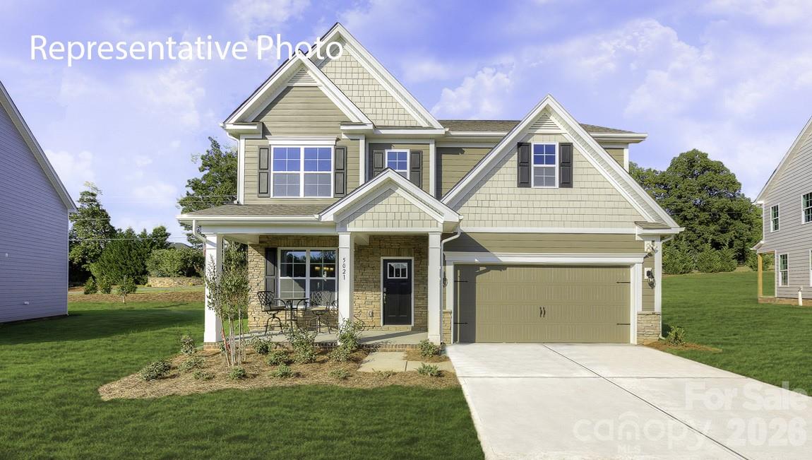 Come see 1044 Tundra Swan Drive located in Indian Trail, NC!

This stunning home showcases impeccable craftsmanship and attention to detail, offering a blend of harmonious style, functionality, and elegance. The London is perfect for those seeking a balance between tranquility and convenience. This home offers four bedrooms, four bathrooms, a sunroom and a two-car garage. The moment you step on the front porch and into the home you’ll be greeted by a foyer that seamlessly integrates the living, dinning, and kitchen areas. The kitchen is equipped with stainless steel appliances, ample storage space, a pantry, and center island, perfect for cooking and casual dining. Adjacent to the living room is a bedroom that provides convenience. The primary suite features an en-suite bathroom with a seated luxury shower, dual vanities, and walk-in closet. The additional bedrooms provide comfort and privacy and share access to a secondary bathroom. A recreational room can be customized to your specific needs. Don’t miss this opportunity!