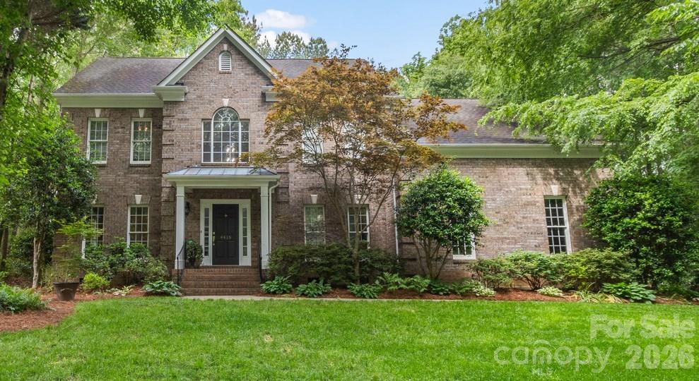 Tucked away on a quiet cul-de-sac in a sought-after waterfront community on Mountain Island Lake, this stunning all-brick home offers timeless style, exceptional living space, and outdoor relaxation at its finest. Inside, you’ll find beautiful wood and tile flooring throughout most of the home, elegant light fixtures, and warm, inviting spaces for your family.
The updated kitchen is designed for both everyday living and entertaining with granite countertops, stainless steel appliances, and a spacious center island. The family room is open to the kitchen and breakfast area and features a gas fireplace and accessible built-ins. Upstairs, the oversized bonus room provides incredible flexibility for a media room, playroom, home gym, or office.
The luxurious primary suite is a true retreat with a spa-inspired bath designed for relaxation and comfort and a  organized walk-in closet. Step outside and enjoy more than 700 square feet of low-maintenance composite decking complete with am electric retractable awning—perfect for outdoor dining, gatherings, or simply unwinding in your private backyard oasis.
Community offers numerous amenities including 2 playgrounds, a soccer field, tennis/pickleball courts, clubhouse and boat ramp into the lake. Sellers are offering a deeded boat slip (Dock G, Boatslip 15) at a nearby community dock for $35,000. 
Terrific location near stores and restaurants. Quick access to I485!