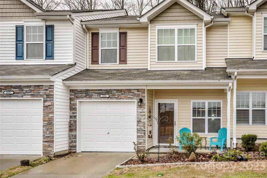 WOW! Welcome home to Woodburn Crossing! This 3 bedroom, 2 1/2 bath townhome is in a desirable neighborhood minutes to shopping, dining, and the interstate. It features 42" kitchen cabinets, granite countertops with stainless steel appliances, and beautiful hardwood flooring throughout the foyer, living room, and dining room. You will love the open floor plan and breakfast area slider that opens to a lovely patio overlooking a private backyard. Not only does this unit include a one car garage with a smart opener, but the neighborhood boasts a community pool and is in the award winning Mooresville graded school district. All appliances including washer and dryer. Owners are local, so no national property management company to deal with! Call to schedule your private showing today.