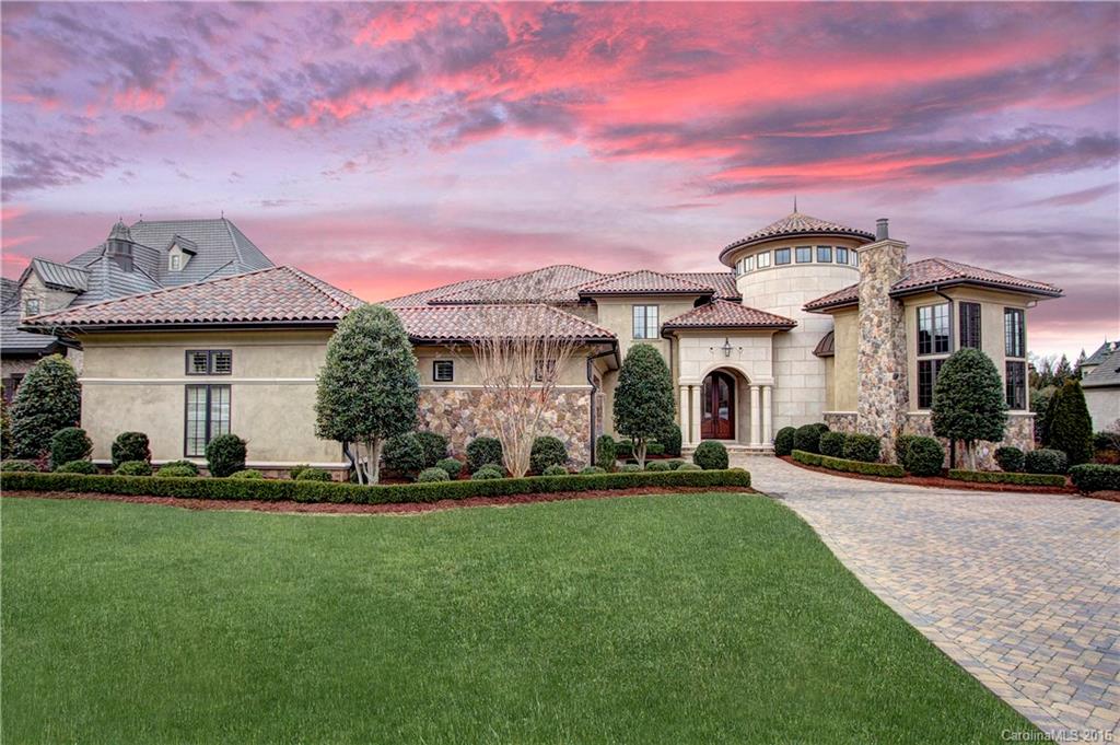 This exquisitely appointed luxury home in prestigious gated Longview on golf course features over 11,400sq.ft.Grand foyer w/dramatic ceilings & curved staircase welcomes you into this exceptional home. Chef's Gourmet kitchen w/ only the finest features, elevator,5 fireplaces,3 laundry rooms,designer office,fabulous master on main, Media room,exercise room,sauna, salt water/heated pool,cabana,extensive outdoor entertainment area,wine cellar,4 car garage w/Porte Cochere!Stunning estate w/upgrades.