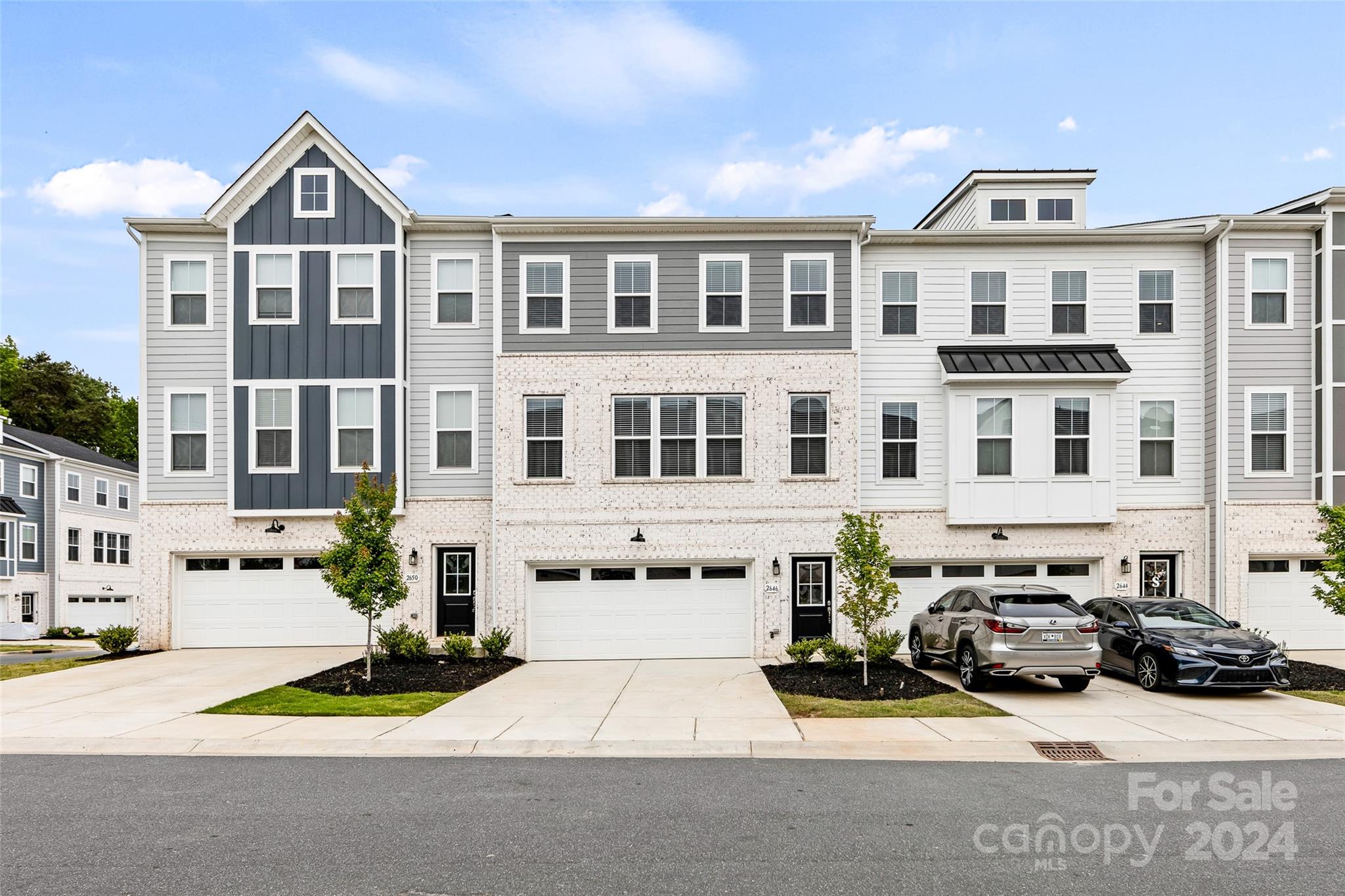 FABULOUS newer construction townhome located in Indian Land! This home is the perfect layout which features a large bonus area on the ground floor, which also has access to a full bathroom. The bonus area leads out to a covered back patio area. The second level of the home features a gourmet kitchen with gorgeous quartz counters, a large center island, plenty of cabinet space for storage and stainless appliances. A large screened porch is just off the living room area. The livingroom features a gas fireplace. There is an awesome office nook off the living room area. Retreat to the third level, and you will find a large primary bedroom complete with a large walk in closet and private en-suite bathroom with stand up shower and double vanities. There are 2 generously sized guest bedrooms, a full bathroom and laundry room to complete this level.