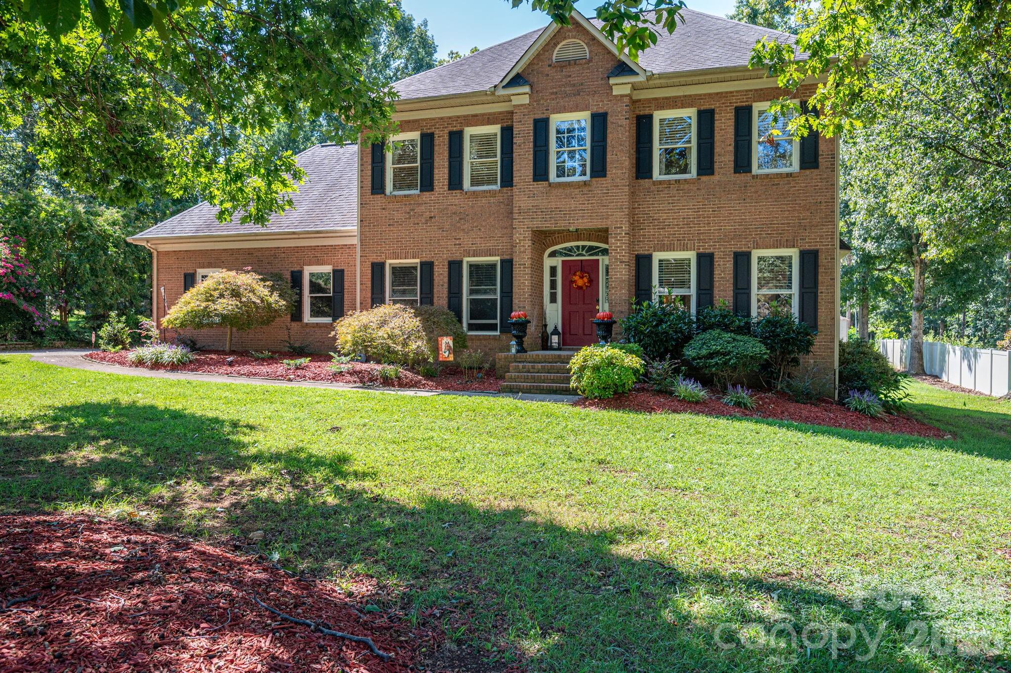This impressive brick two-story home invites you in with timeless curb appeal and thoughtful upgrades throughout. Inside, luxury meets everyday comfort—from the sleek luxury vinyl plank flooring and abundant cabinetry in the kitchen to the granite countertops that elevate every culinary moment. The 2-car garage and included outbuilding offer plenty of room for hobbies, storage, or a workshop.

Relax outside in the fully fenced, in-ground pool or enjoy easy maintenance with the in-ground irrigation system keeping the landscape pristine. The home boasts four bedrooms and three bathrooms—ideal for families or guests—highlighted by a generous master suite that’s a true retreat. Unwind in the garden tub, refresh in the large tiled shower, and experience convenience at the double-sink vanity.

The dining room, framed by a charming bay window, feels bathed in natural light, setting the stage for memorable meals. With a 2021 HVAC system, comfort is assured year-round.