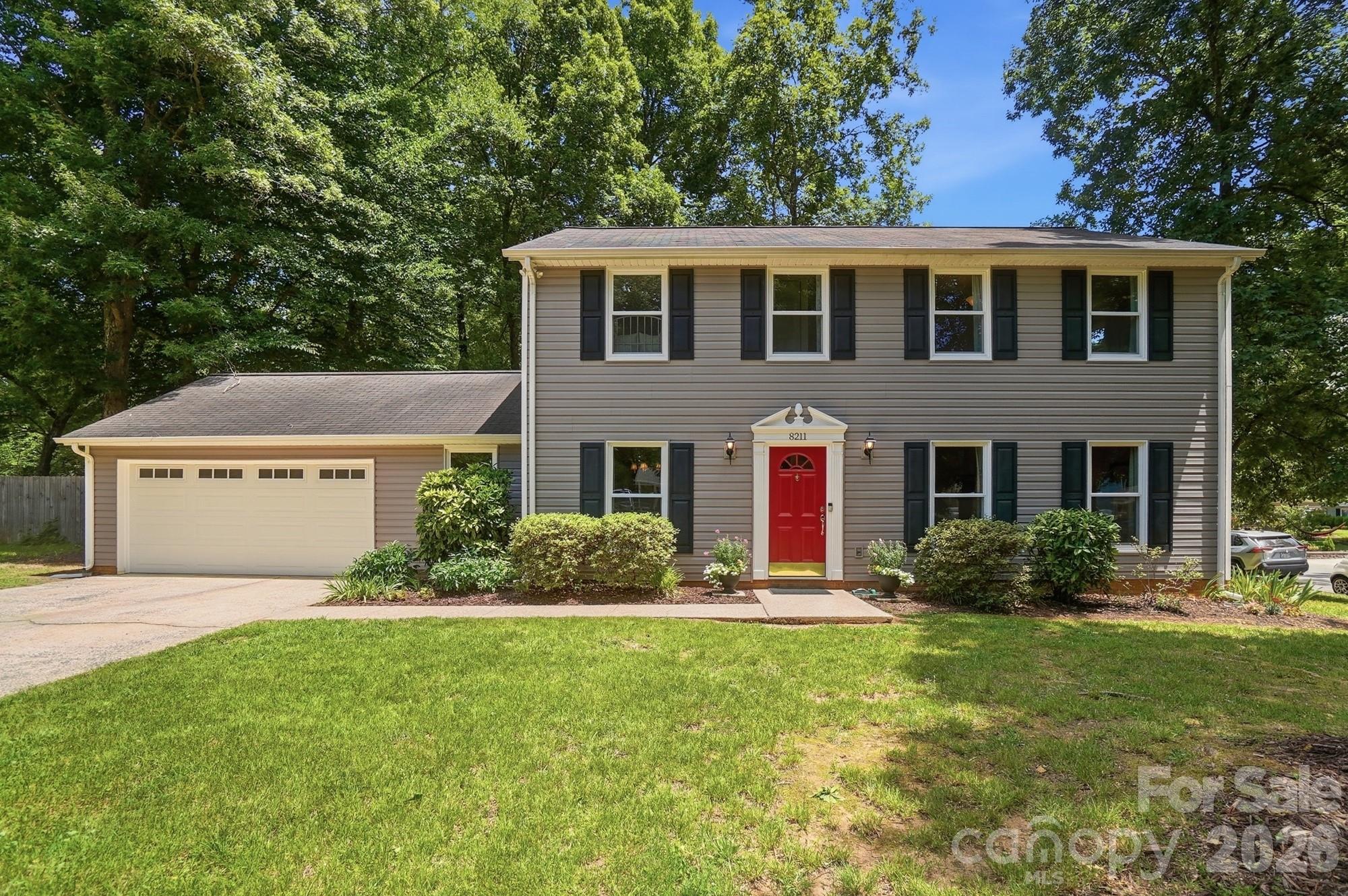 Welcome home to 8211 Mahogany Drive in Charlotte! This spacious 4-bedroom, 2.5-bath home offers the perfect blend of comfort and convenience with no HOA restrictions. Inside, you'll find a functional floor plan with generous living spaces, providing plenty of room for everyday living and entertaining. The spacious primary suite offers a private retreat, while the additional bedrooms provide flexibility for guests or a home office. Conveniently located near shopping, dining, parks, and major commuter routes, this home is ready for its next owner. Don't miss the opportunity to make this Charlotte property your own!