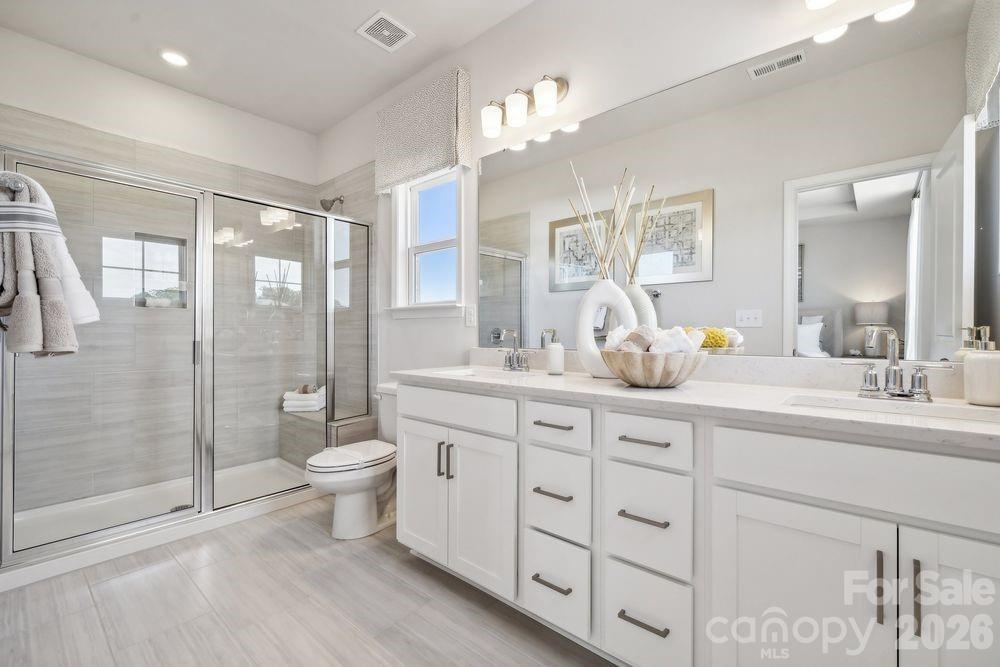 What's Special: 1st Floor Guest Suite | Fireplace | End Unit. New Construction - August Completion! Built by America's Most Trusted Home Builder. Welcome to the Breckenridge II at 1820 Alexander Village Main Drive in Senata at Research Park! This stylish new three-story townhome offers a flexible and thoughtfully planned layout, starting with a first-floor bedroom and full bath, ideal for guests or a private home office, with convenient access to the two-car rear garage. The main living level features an open-concept design where the kitchen flows seamlessly into the casual dining area and great room, complete with a warm fireplace for everyday comfort. White cabinets, quartz countertops, and a tile backsplash create a fresh, modern look, while the outdoor living space provides the perfect place to relax or entertain. Upstairs, the primary suite offers a peaceful retreat, joined by two secondary bedrooms that share a full bath and a centrally located laundry area. Welcome to Senata at Research Park in Charlotte, NC. Enjoy on-site favorites like Starbucks and Chipotle, with Trader Joe’s and local dining just across the street. Research Park and Vanguard Campus are moments away. With major highways and the Lynx Blue Line nearby, these townhomes offer easy access to Uptown Charlotte, work, school, and weekend fun. Additional Highlights Include: Storage at 2nd floor, ledge at primary bath, upgrade cabinet hardware, pendant lights over kitchen island, quick tread at stairs, and open railing and spindles from 1st floor to 2nd. Photos are for representative purposes only. MLS#4381381