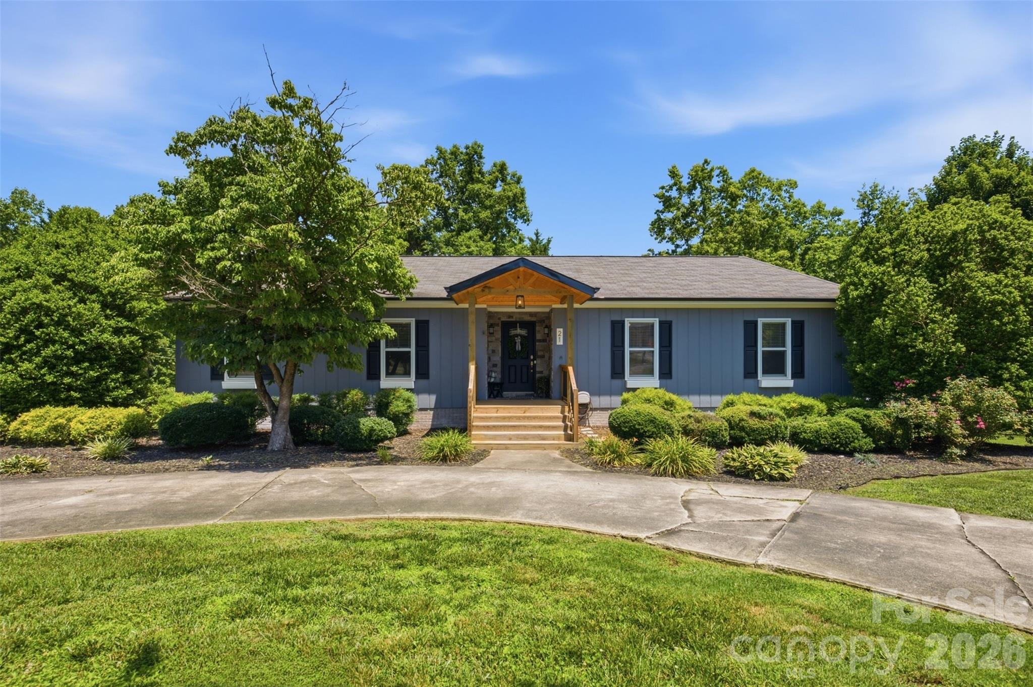 Golf-course community without the HOA! Sellers offering $2,000 concession so buyer can pick stain of their choice for the newly finished front deck and spacious back deck! You won't want to miss this one, schedule your showing today! 
This beautifully remodeled home is in an unbeatable location, just a "chip shot" away from the lovely Brushy Mountain Golf Course and its popular restaurant, and also convenient to Hickory, Statesville, Lenoir, and Taylorsville. 
On the outside, this home features a circular driveway in the front, and an additional driveway in the rear leading to the oversized two-car garage, making parking a breeze with plenty of room for guests' vehicles. A fully fenced backyard means it is move-in ready for pet owners. The new deck makes for a beautiful first impression, and will be even better when buyer has stain of their choice applied thanks to a $2,000 credit offered by the seller so they can pick their perfect color. Matured landscaping makes for beautiful curb appeal around the home, this house is sure to impress before guests even walk through the door!
The inside is equally desirable thanks to plenty of recent updates. The main living area feels so spacious with raised, vaulted ceilings. The large primary suite features a recently updated primary bathroom. The finished basement adds tons of open, usable flex-space that would make for a great home-gym, casual den area, or anything else you can imagine.