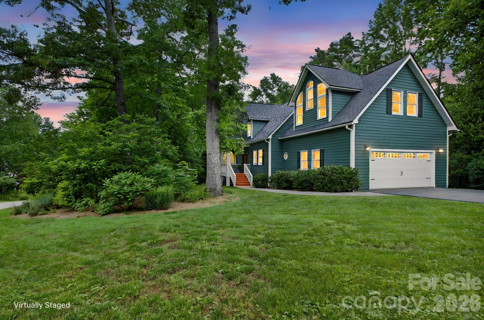 Designed for both everyday living and memorable gatherings, this one-of-a-kind custom home offers the perfect blend of comfort, style, and outdoor enjoyment. The spacious open floor plan creates an inviting atmosphere for entertaining, while French doors open to an impressive screened porch, seamlessly connecting indoor and outdoor living spaces.

Step outside and discover what truly sets this property apart—a large, level, fenced backyard designed for making memories. The outdoor oasis features a huge deck, stone patio, fire pit, and a fully equipped outdoor kitchen and bar, creating the ideal setting for everything from casual evenings with friends to weekend celebrations.

Thoughtful updates provide added peace of mind, including a new HVAC system installed in 2025 and a roof that is only 10 years old.

Tucked away on a quiet cul-de-sac, yet just 15 minutes from downtown Asheville, this exceptional property offers the rare combination of privacy, convenience, and outstanding indoor-outdoor living.