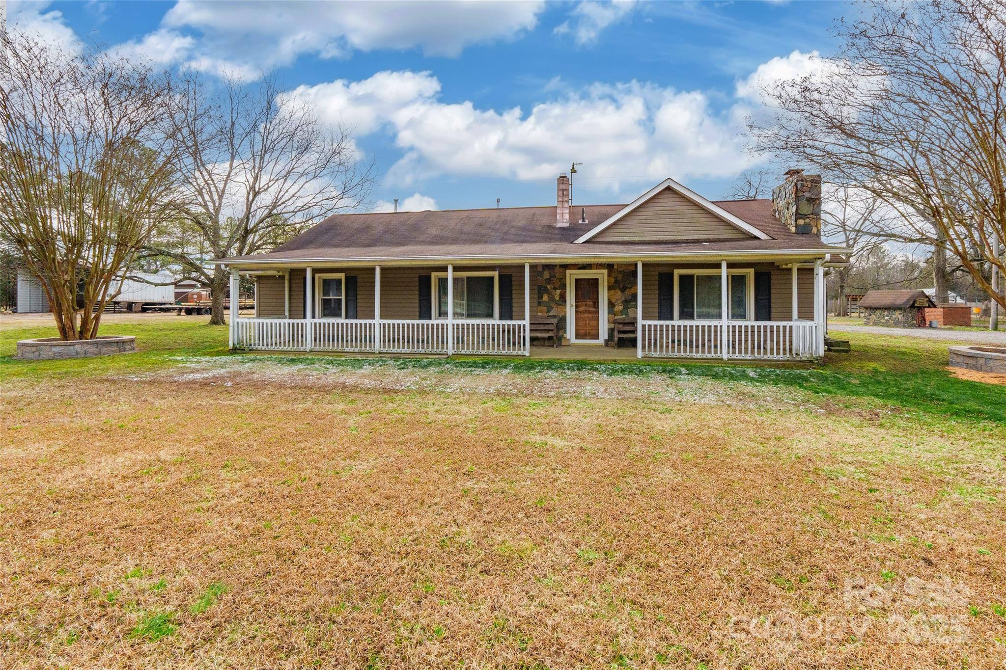 Rare opportunity to own an equestrian property and working farm that has all that is needed to train, ride and board horses and to raise cattle and chickens for beef and eggs! The home boasts a custom kitchen with rugged finishes but luxury Viking appliances. Rough-cut pine walls, custom cabinetry and amazing butcher block surfaces throughout. The primary bedroom and bath are a retreat with a huge walk-in shower and a large walk-in closet. The outdoor kitchen features a built-in Coyote gas grill. The farm is the true gem, with the majority of improvements built within the past four years: two 5-stall barns, covered arena w/ 4 stalls, chicken and rooster houses, 3-bay equip shed, cattle feed shed, Priefert Hot Walker, Pyranha fly spray system and a hayloft retreat!