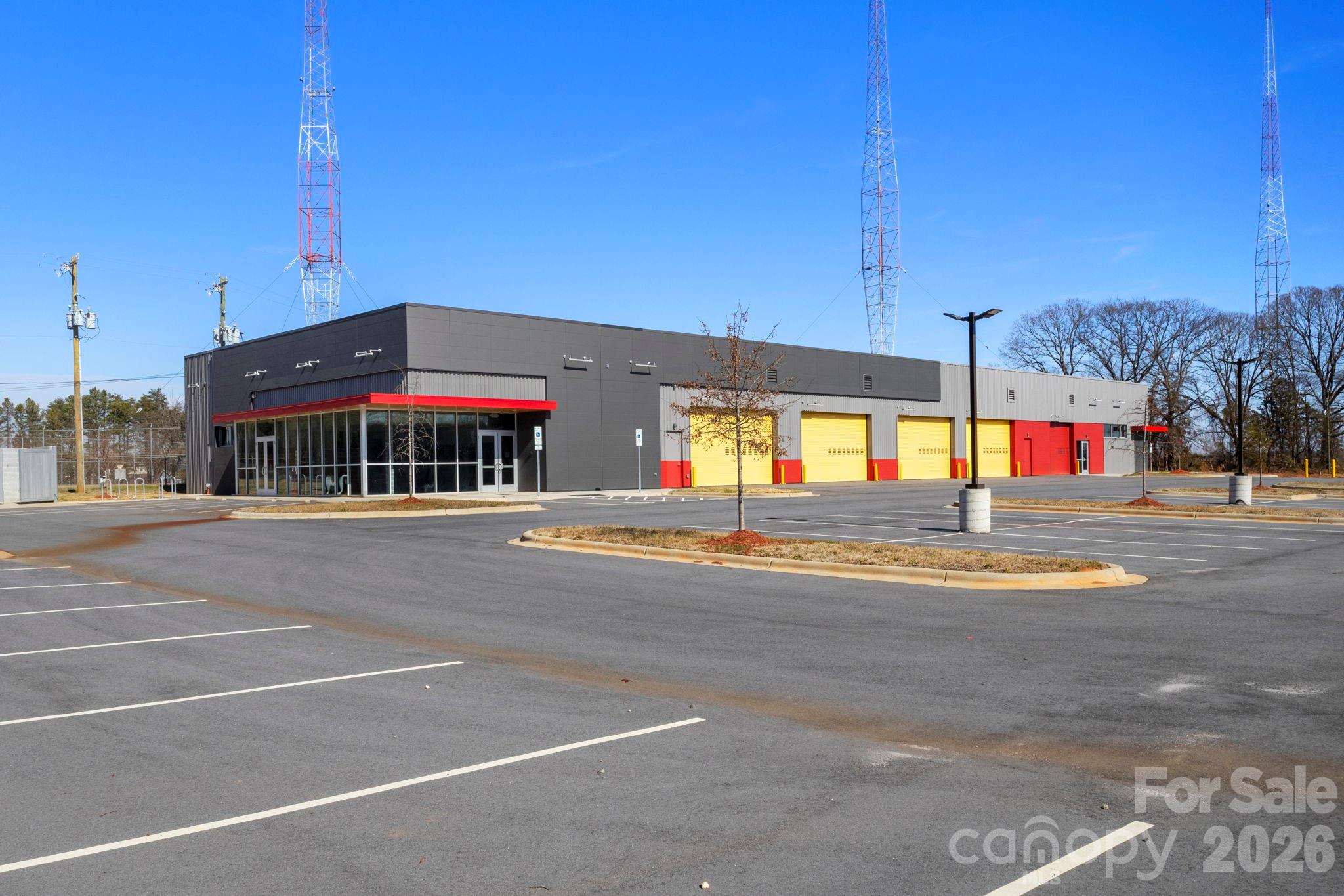 This commercial property in Charlotte began construction in 2020 and was completed in 2024. Since then, it has never been used, offering a brand-new, modern, and innovative space. With 15,161 square feet of construction on 2.16 acres, it features abundant parking and an incredible location just minutes from downtown. This is a fantastic opportunity for anyone looking to launch or relocate their business in a cutting-edge environment!