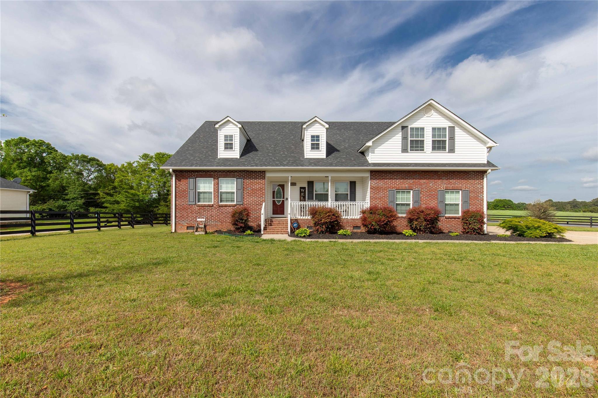 Southern Charmer! This meticulously maintained residence offers three bedrooms and two full bathrooms in a thoughtful split-bedroom layout. The property is beautifully framed by distinctive 4-panel Kentucky fencing with striking brick columns flanking the driveway entrance.
The covered rear patio creates an exceptional outdoor retreat, complete with a spa, brick fireplace, and tranquil fountain water feature. Inside, dual living areas provide maximum flexibility—one currently configured as an office, the other offering generous space for relaxation and entertaining.
The large, spacious kitchen provides ample workspace and storage for culinary enthusiasts. The primary suite features a private en-suite bathroom and a spacious walk-in closet for optimal convenience.
Upstairs reveals an oversized bonus room with unlimited potential, plus a large storage area and a convenient half bath. The attached garage includes additional storage space to meet all your organizational needs.