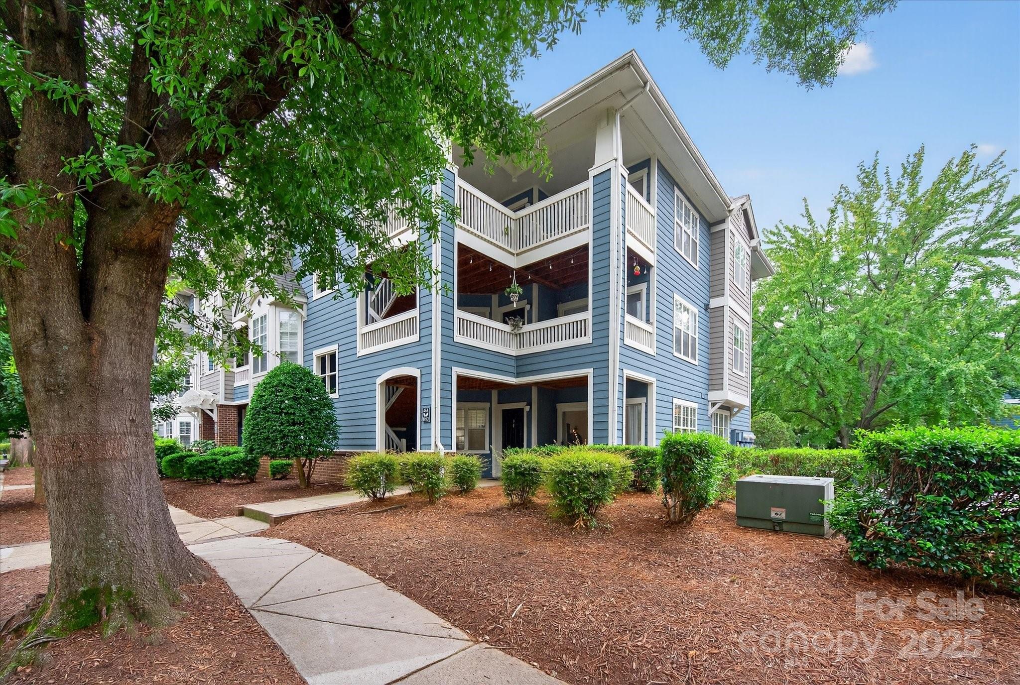 Move-in ready, end unit condo in the charming Olmsted Park subdivision in Dilworth. Close to all the amenities that Dilworth, Southend and Uptown Charlotte have to offer. This property features lots of natural light, hardwoods, kitchen with granite counters, stainless steel appliances and plenty of cabinets. Spacious living room with sliding doors to the private front covered porch. Primary has walk-in closet, large bathroom with custom vanity and tile.  New carpet in primary and secondary bedroom & fresh paint. Community features a large inground pool, clubhouse and outdoor grilling area. There is an abundance of parking..on street and parking lot. Location cannot be beat ...shopping, restaurants, entertainment all at your fingertips.