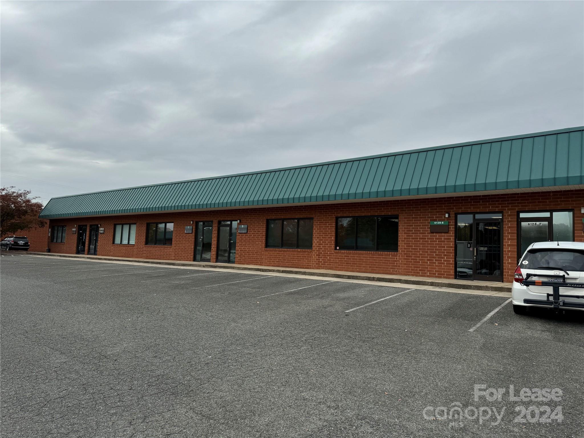 Looking for a prime spot for your business? This 1,896 sqft office space is conveniently located just off Hwy 16, with easy access to I-485, I-85, I-77, and Uptown Charlotte. Water, trash, landscaping, and pest control are all included, so you can focus on your business without extra hassle. The space includes a freshly painted private office with a built-in desk and filing cabinets for a well-organized work environment, plus a kitchen area and two bathrooms for your teams comfort. In the back, there’s a connected warehouse with a roll-up door and walkout door, giving you plenty of storage and workspace. The office area is +/- 1,176 sqft, while the warehouse offers +/- 720 sqft. The rear garage door is 12' x 12', providing easy access for larger items. Schedule a viewing today to see how this versatile office space could work for your business!