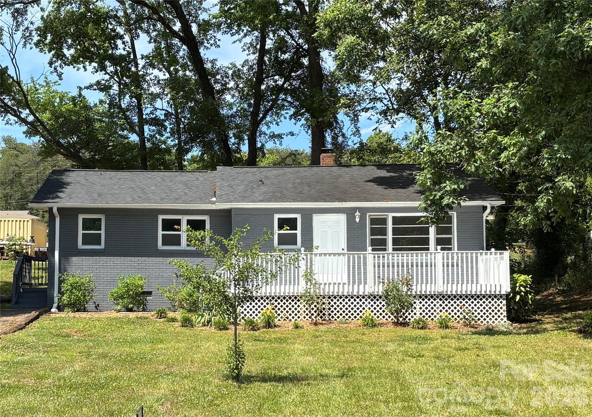 Charming, move-in ready full brick ranch nestled on almost a half-acre lot in Mount Holly. This quaint 3-bdrm. 1-bath home offers the perfect blend of comfort and convenience. The bright and inviting interior features original hardwood flooring, fresh paint throughout, new vinyl flooring in kitchen and bath and new interior doors, a tankless water heater that was recently replaced. Living room with large picture window...Kitchen with breakfast area, stainless steel appliances and some new cabinetry. Home was fully renovated in 2020-2021 to include new appliances, new roof, new windows except large picture window in living area, new septic tank and moisture barrier. The exterior brick and deck both were just painted! Nice size lot! Perfect for first time buyers, downsizers or investors. This home combines affordability, location and sooo many updates!!Motivated seller!!