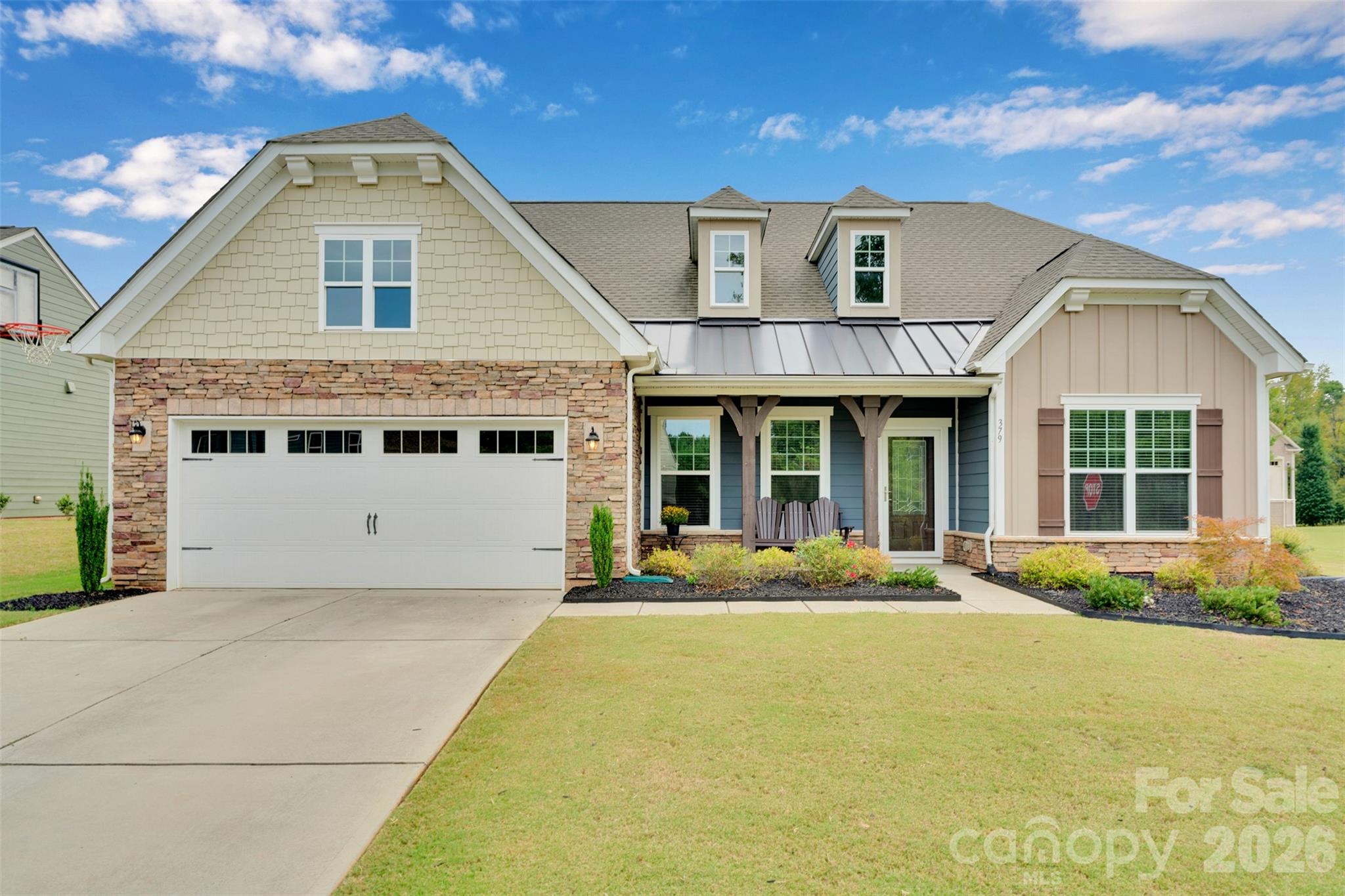 379 Kentmere Lane | Summerhouse | Lake Wylie


Beautifully maintained one-level home in the desirable Summerhouse community. Built in 2017, this thoughtfully designed residence offers an open layout ideal for both everyday living and entertaining.


The great room with gas fireplace flows seamlessly into the kitchen and dining area. The kitchen features a large peninsula perfect for buffet-style serving or bar seating, along with a double oven and gas cooktop for effortless cooking and hosting. A standout feature is the rear sunroom with sliding windows, allowing you to enjoy it as a screened porch or enclosed retreat. The space offers views of the oversized corner lot creating a private and relaxing setting.

Located just minutes, even golf cart distance, from Lake Wylie newest retail development, offering convenient access to Harris Teeter, Starbucks, dining, and everyday essentials without sacrificing neighborhood tranquility. Summerhouse amenities include two pools, pickleball courts, clubhouse, playground, and nearby park space. Low-maintenance living with comfort, convenience, and community.