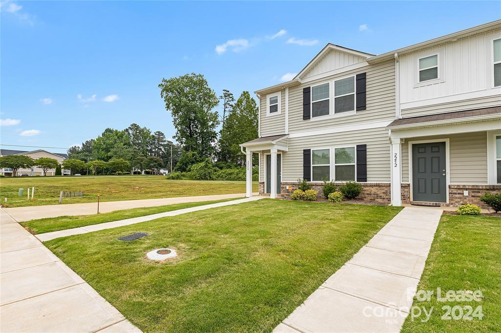 Welcome to this perfectly maintained townhome! This property is nearly new, built in 2022. The property boast two spacious bedrooms, an oversized primary suite, and two and a half bathrooms. The kitchen features white cabinetry and stainless appliances (Includes: range, microwave hood, dishwasher, and refrigerator). The primary suite has a private bath with dual vanity sinks and a walk-in closet. This property is situated only minutes from family fun, grocery, and shopping.