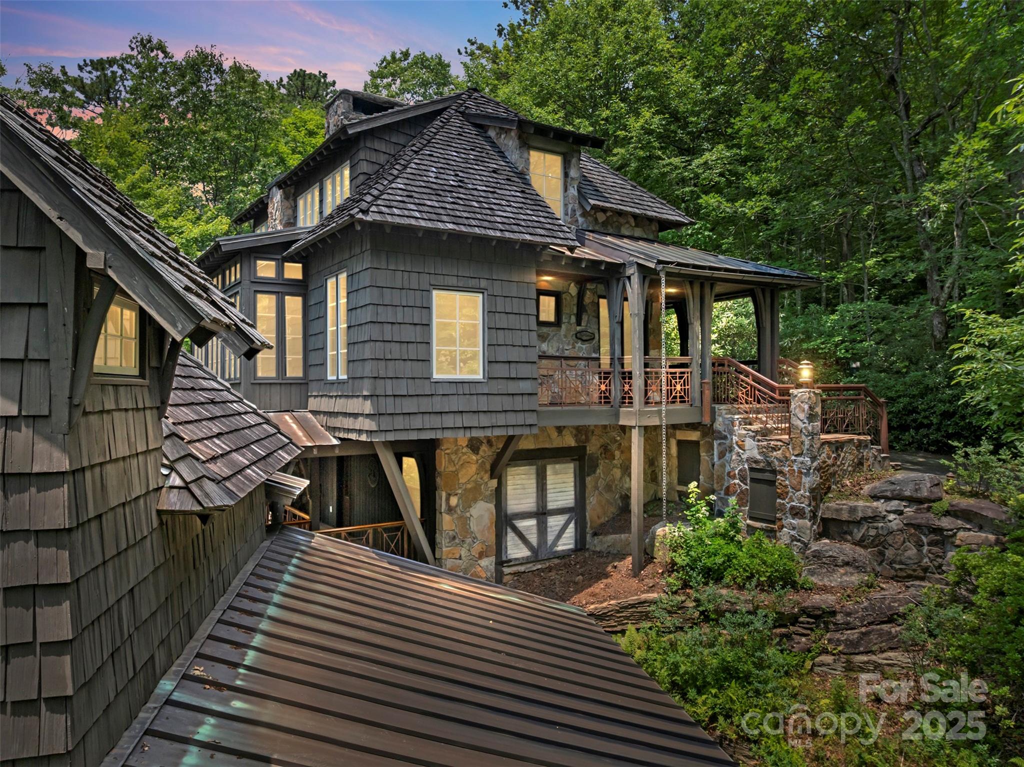 Welcome to Idyll Cottage, a European-style chalet in the gated Cliff Ridge community at Caesars Head. The neighborhood is positioned along US 276 between Greenville and Brevard. This custom mountain retreat offers 2622 sq ft of rustic elegance on a lush .71-acre lot. The main home features 3 bedrooms and 3 baths, plus a separate 1-bedroom guest apartment with its own entrance. Crafted with natural materials like Tennessee fieldstone, wood, copper, and cobblestones, the home features exposed beams, hickory floors, three stone fireplaces, and antique Victorian steel porch railings. Highlights include vaulted ceilings, a dedicated office, high-speed internet, and separate upper/lower entrances. Outside, enjoy two cobblestone driveways, a carport with storage, natural gardens, and a lifetime shake roof with copper accents. Community amenities include two pools, clubhouse, gym/game room, tennis courts, stocked lake, and golf cart-friendly roads. Offered turn-key with negotiable furnishings.
