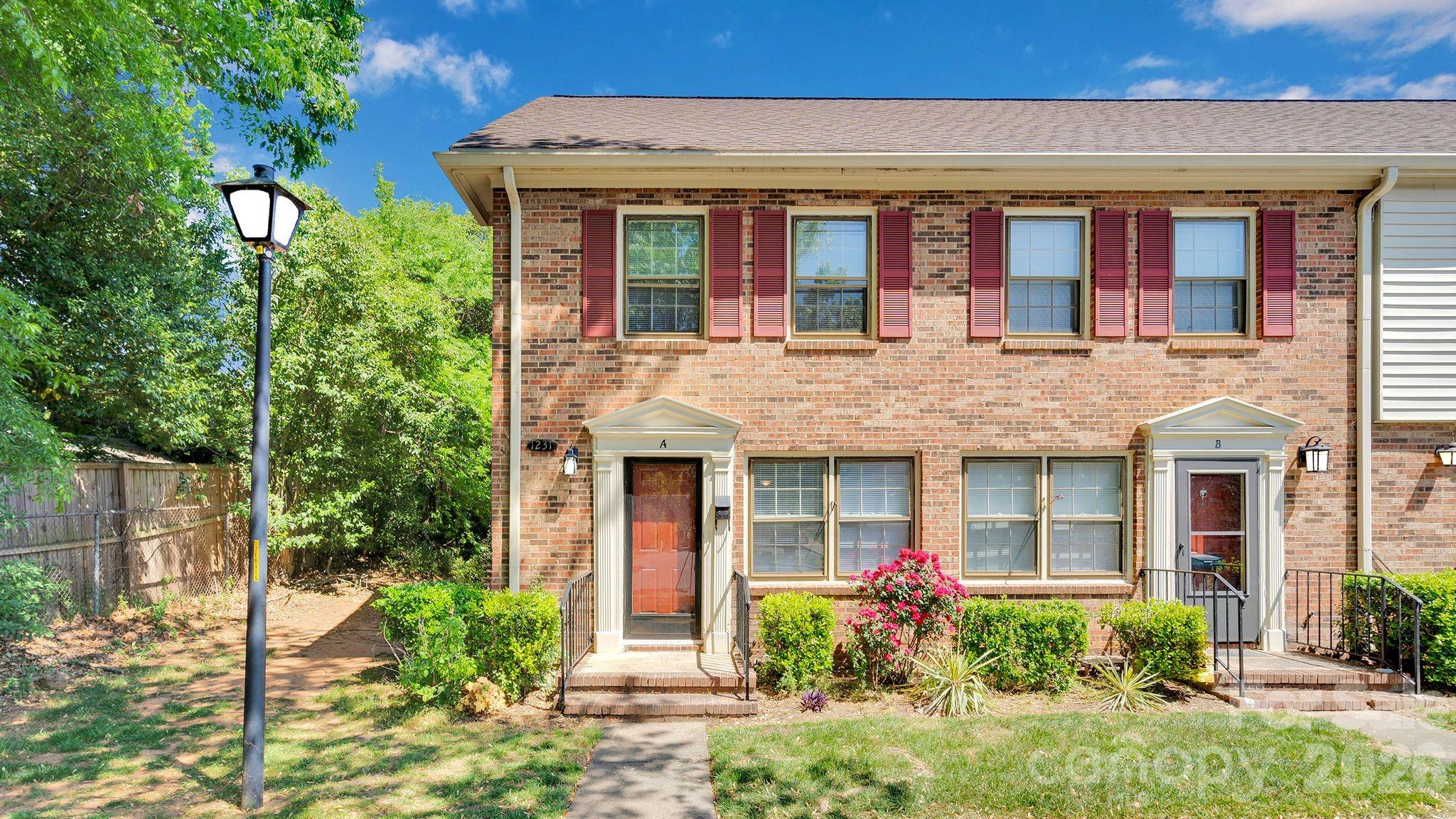 Fully updated end-unit townhome-style condo in a highly connected South Charlotte location, just steps from the Lynx Blue Line—making daily commutes and access to the city incredibly convenient. Ideally positioned near South End, SouthPark, Ballantyne, Uptown, and Charlotte Douglas International Airport, this home offers both lifestyle and long-term value for homeowners and investors alike.  This full brick condo has been thoughtfully updated and is truly move-in ready. Fresh paint and new LVP flooring flow throughout the entire home, creating a clean, modern feel. The updated kitchen features new shaker-style cabinetry, quartz countertops, under-mount sink, subway tile backsplash, and a full suite of stainless steel appliances including the refrigerator. New lighting throughout—paired with ceiling fans in both bedrooms, the living area, and kitchen—adds both comfort and style.  The main level includes an updated powder room, while upstairs you’ll find a fully renovated bathroom with a new vanity, updated fixtures, and a subway tile shower/tub with a built-in niche. As an end unit, the home benefits from a more private setting and includes a private patio area—ideal for relaxing or outdoor entertaining.  Whether you're a first-time buyer looking for a low-maintenance home or an investor seeking a strong rental opportunity in a high-demand area near transit and major employment hubs, this property checks all the boxes. Seller notes that recent cosmetic updates were all performed by contractors but completed without permits.