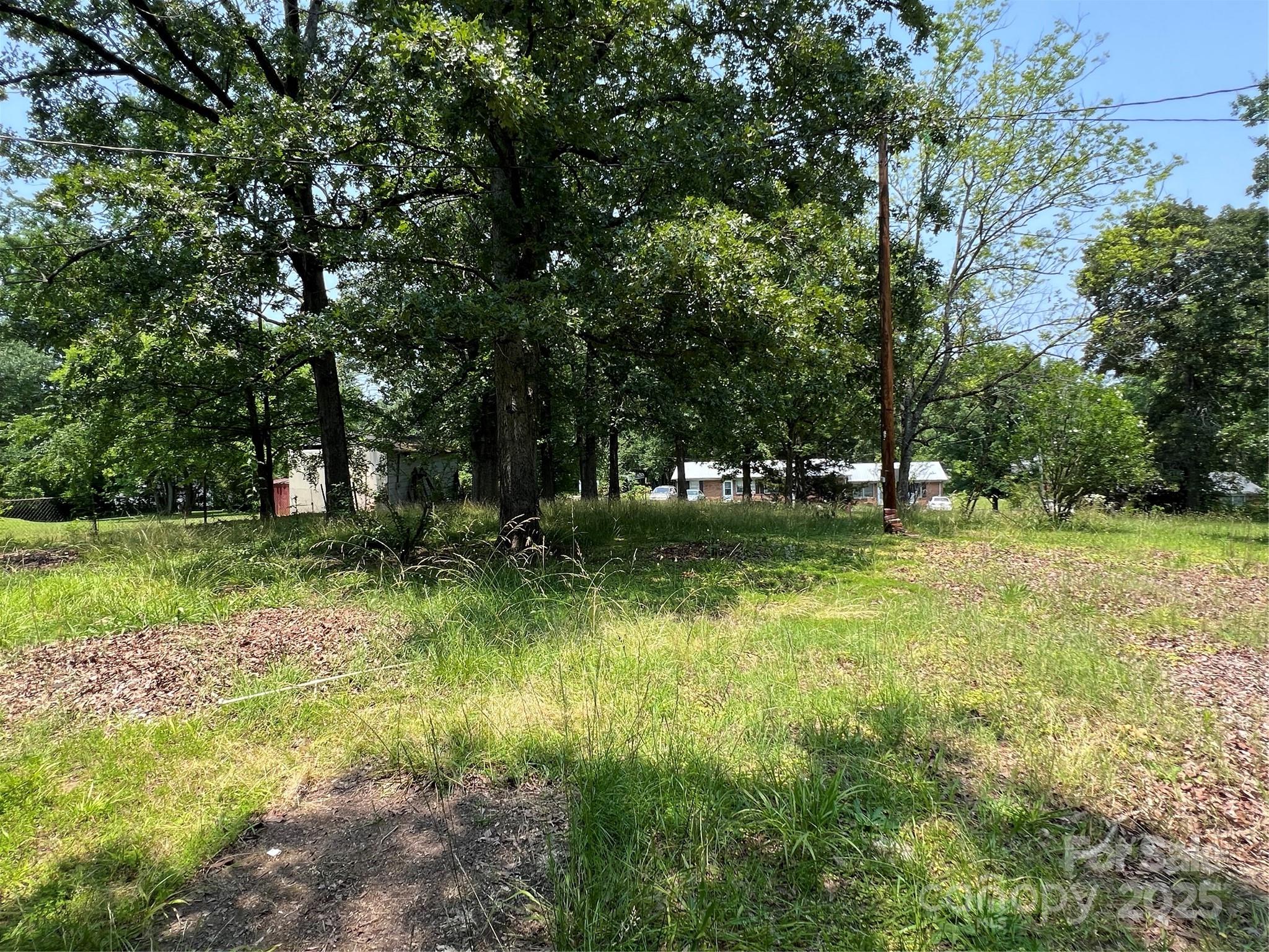 What an incredible opportunity in the City of Lancaster, SC! Prime Building Lot + City Water & City Sewer + Perfect, Quiet Location + Great Price + No HOA + Multiple Building Options, Including Stick Build, Manufactured Doublewides, and Modular Homes = An Amazing Opportunity! This property is IDEAL for “Your Vision”! Offering ample space and endless possibilities, it’s an ideal canvas to bring your dreams to life! Conveniently located in The City of Lancaster where you’ll have easy access to shopping, dining, medical facilities and more. Just minutes from Hwy 9, Hwy 521, and a quick drive to Charlotte, Rock Hill, Columbia and surrounding areas. Stick built and Doublewide manufactured homes may have restrictions on size and foundation options including but not limited to size for manufactured (24x40 or larger), permanent foundation (brick foundation), roof (shingled), other possible restrictions. Please contact the City of Lancaster for additional information. All tap fees and installation fees are the buyers responsibility.