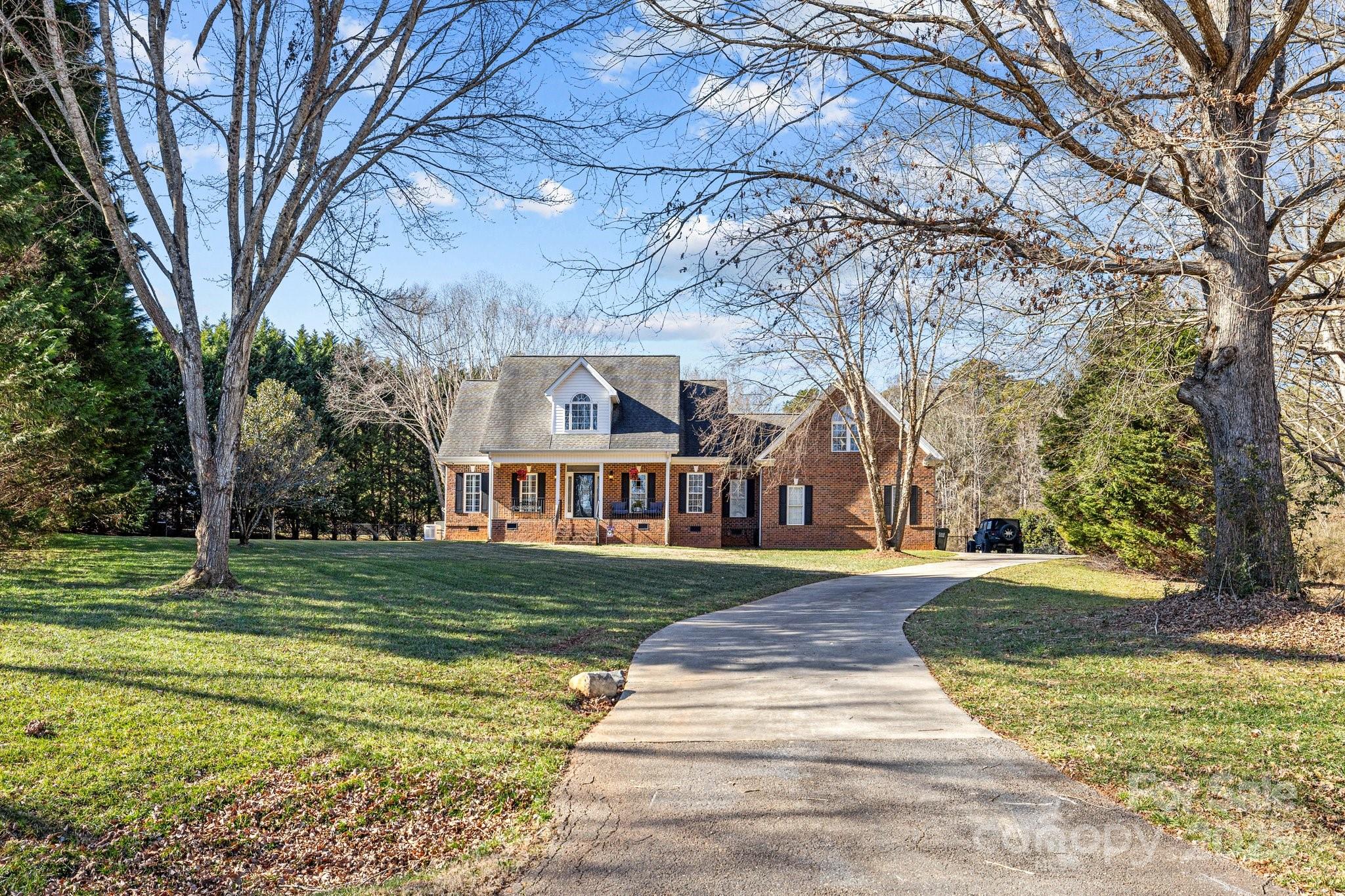 HERE IT IS. Beautiful Ranch w/large Bonus Room over Garage on well maintained, level, 1.27 acre culdesac lot. Home is in move in condition. Exterior space includes front porch, fenced back yard, fantastic pool, & an 8 person hot tub installed March 2024. Deck and tons of patio space w/privacy. Ext trim lighting on entire home can be operated by phone app. Hardwired camera system. Inside the Home you will find an open foyer, Great Room w/ventless gas log fireplace, large dining/flex room, Kitchen w/new granite countertops & large deep sink, and breakfast area.  Split BR plan & open living space. Sunroom great for relaxing.  Screened Proch & deck extended in May 2024 overlook the Pool & spacious back yard. Crawl Space fully encapsulated w/ de-humidifier.  Full water filtration system for incoming well water. 24kw Generac Generator that runs on natural gas.  Interior walls all recently painted. Large Garage offers plenty of extra storage space.  Walk in attic area from the bonus room.