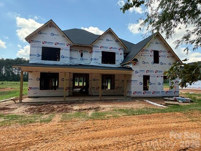 Welcome to this beautifully designed new construction home offering the perfect blend of modern style, functionality, and spacious living. Featuring 4 bedrooms, 3 full bathrooms, and dedicated office/study spaces on both levels, this home is ideal for today's flexible lifestyle.

The open-concept floor plan creates a seamless flow between the main living areas, making it perfect for everyday living and entertaining. The chef-inspired kitchen showcases a large center island, quartz countertops, double ovens, an electric cooktop, stainless steel vent hood, and abundant cabinet and counter space. The impressive family room features vaulted ceilings, an electric fireplace, and expansive windows that fill the space with natural light.

A guest bedroom and full bath are conveniently located on the main level, along with a private office or study that can accommodate a variety of needs, including a home workspace, playroom, or flex room.

Upstairs, the spacious owner's suite offers elegant tray ceilings and a luxurious en-suite bath complete with a freestanding soaking tub, tiled walk-in shower, dual vanities, and an oversized walk-in closet. The thoughtfully designed closet provides easy access to the walk-in laundry room for added convenience. Additional bedrooms, a full bath, and a second office or study complete the upper level.

Step outside to enjoy the covered back porch overlooking a large backyard with plenty of room for outdoor activities, gardening, pets, or future customization.

With quality finishes, versatile living spaces, and exceptional attention to detail throughout, this stunning new construction home is ready to welcome its first owners. Don't miss the opportunity to make it yours.