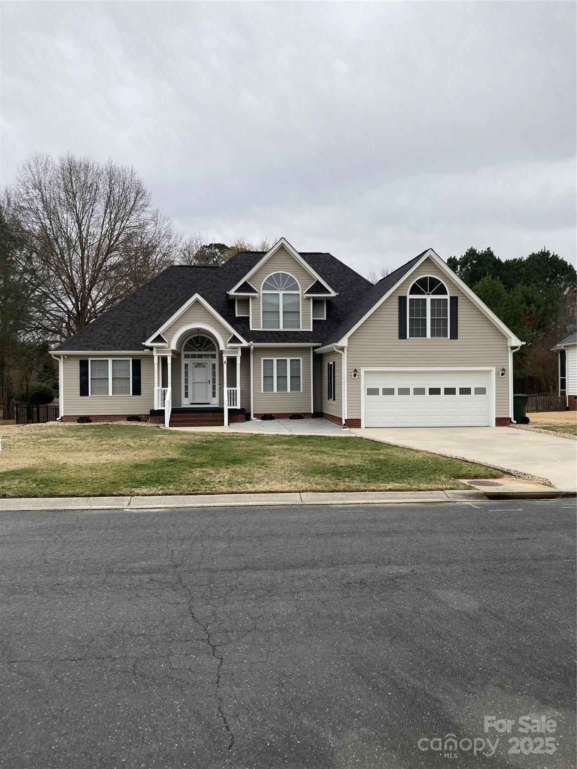 Recently updated home in highly sought after Rollingwood Subdivision in Rock Hill.  Minutes from I-77, shopping, restaurants and Lake Wylie. Located on quiet corner lot with fenced backyard, large deck, irrigation system, newer shed. You will find home to be a very clean move in ready 3 bedroom/2.5 bath with finished bonus room over garage.  Primary suite on main level with newer remodeled bath with large elegant walk-in shower including sitting bench, added bath/linen closet and separate dual vanities.  Upstairs are 2 bedrooms with large closets and full bath with double vanity. Large dining and family room.  Bonus room provides even more living space/storage availability and has it's own AC/heat unit.  Many home upgrades:  newer HVAC units, roof, shed, carpet/LVP/tile flooring, water heater, ceiling fans, toilets, paint, smoke detectors, family room sliding glass door, crawl space work including humidifier, whole house filtration system.