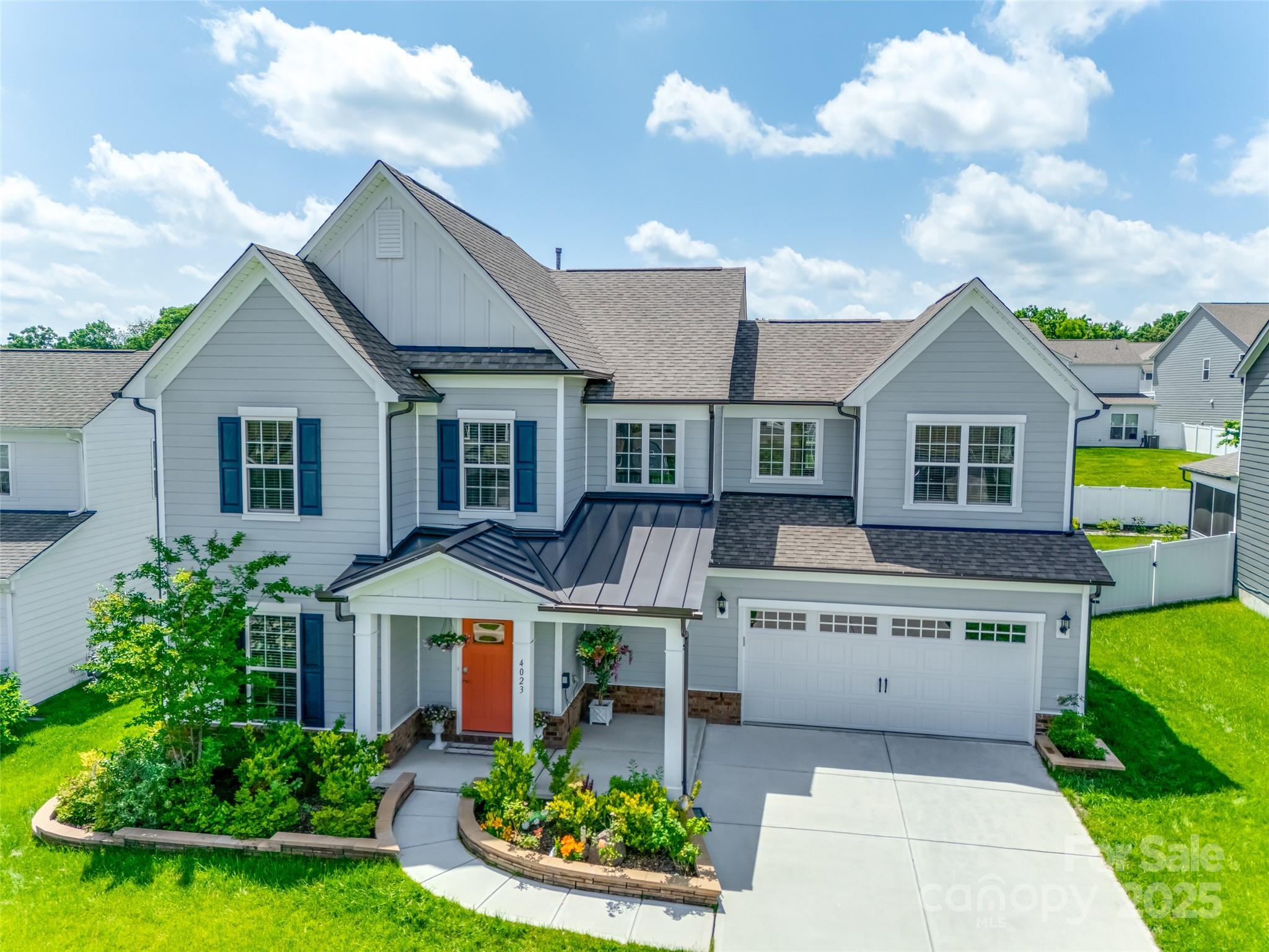 With over 600 sqft of paver patio area, incl a covered back porch, plus expansive & level backyard, privacy fence, & more - this home has a yard you won't want to miss! Step inside on prefinished wood floors & you are welcomed by a formal dining. The open floor plan gives way to a chef's dream kitchen, incl SS hood, gas range, gleaming quartz counters, wall oven, butler's pantry, abundant island, & addl flex area. The great room is grounded by a stone fireplace, & be sure you don't miss the main level guest bed w/ ensuite bath! Make your way upstairs to a primary suite that has all the bells & whistles, incl tray ceiling, soaking tub, dual vanities, walk-in tiled shower w/ rainhead, & a built-in armoire. The upstairs boasts a laundry w/ sink & loads of cabinets, & another 3 beds, 2 baths, & spacious loft. McCullough is a lifestyle rich community w/ 2 pools, sport courts, dog park, near downtown Pineville, & 10 min from a light rail stop that takes you straight to uptown - welcome home!