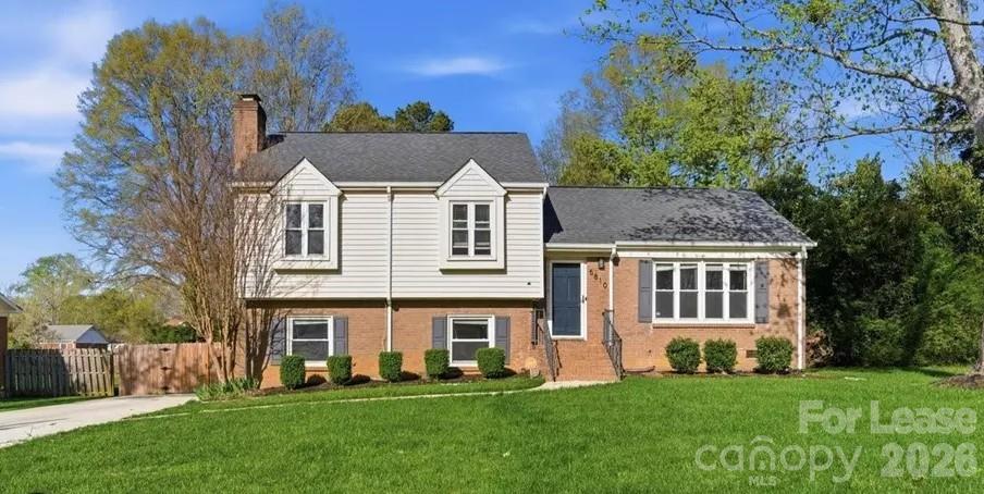 A Beautiful split-level home with no HOA, offering flexible living and great potential. Home features include an extended driveway with ample parking, brand-new HVAC, fresh interior paint, and beautiful floors. The main level offers an open-concept living area with abundant natural light. Upstairs includes two secondary bedrooms, a full bath, and a primary suite with private bath. The lower level features a separate living area, mini kitchen, bedroom, full bath, with private access!-ideal for added flexibility. Enjoy a flat, fully fenced backyard with patio, deck and limitless potential perfect for outdoor entertaining. Conveniently located less than 15 minutes from Uptown Charlotte with easy access to shopping, dining, and major roadways. Come and see all the opportunities that lie ahead!