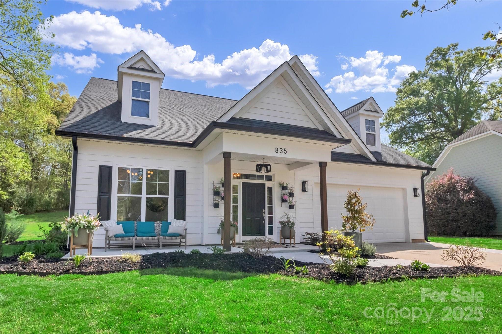 Designed for comfort and effortless entertaining, this 4-bedroom, 3.5-bath home features a spacious, open floor plan filled with natural light. Recently renovated, it boasts luxury vinyl plank flooring throughout and fresh paint inside and out for a modern feel. The kitchen shines with upgraded appliances & new quartz countertops, while a recently installed A/C system & water heater ensures year-round comfort. A new gutter system was also installed. The primary suite offers a private retreat with a cozy seating area, large walk-in closets & spacious en suite bath. A bonus room with a full bath is currently used as a fourth bedroom but due to its size, offers great flexibility. Step outside to enjoy the expansive lot, where privacy and natural beauty create a serene escape. Whether you're relaxing on the patio or soaking in the peaceful surroundings, this outdoor space is yours to enjoy. Don't miss this opportunity! Schedule your private tour today & make this exceptional property yours