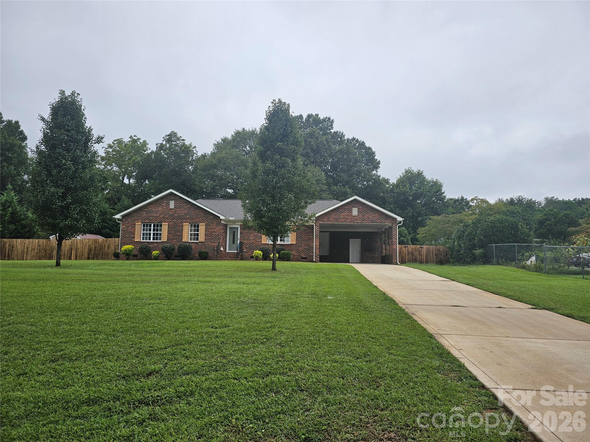 Welcome to this well-maintained ranch brick home that combines classic charm with thoughtful modern updates. New roof installed in 2020, and kitchen has just been updated(2025) with new dishwasher, fridge and range. Inside, you’ll find a comfortable layout that includes wood floors in the kitchen, living room and hall. Carpet in the bedrooms and tile in the bathrooms. This property offers low-maintenance living with solid brick construction and practical upgrades, making it an excellent option for first-time buyers, downsizers, or investors. Schedule your tour today!