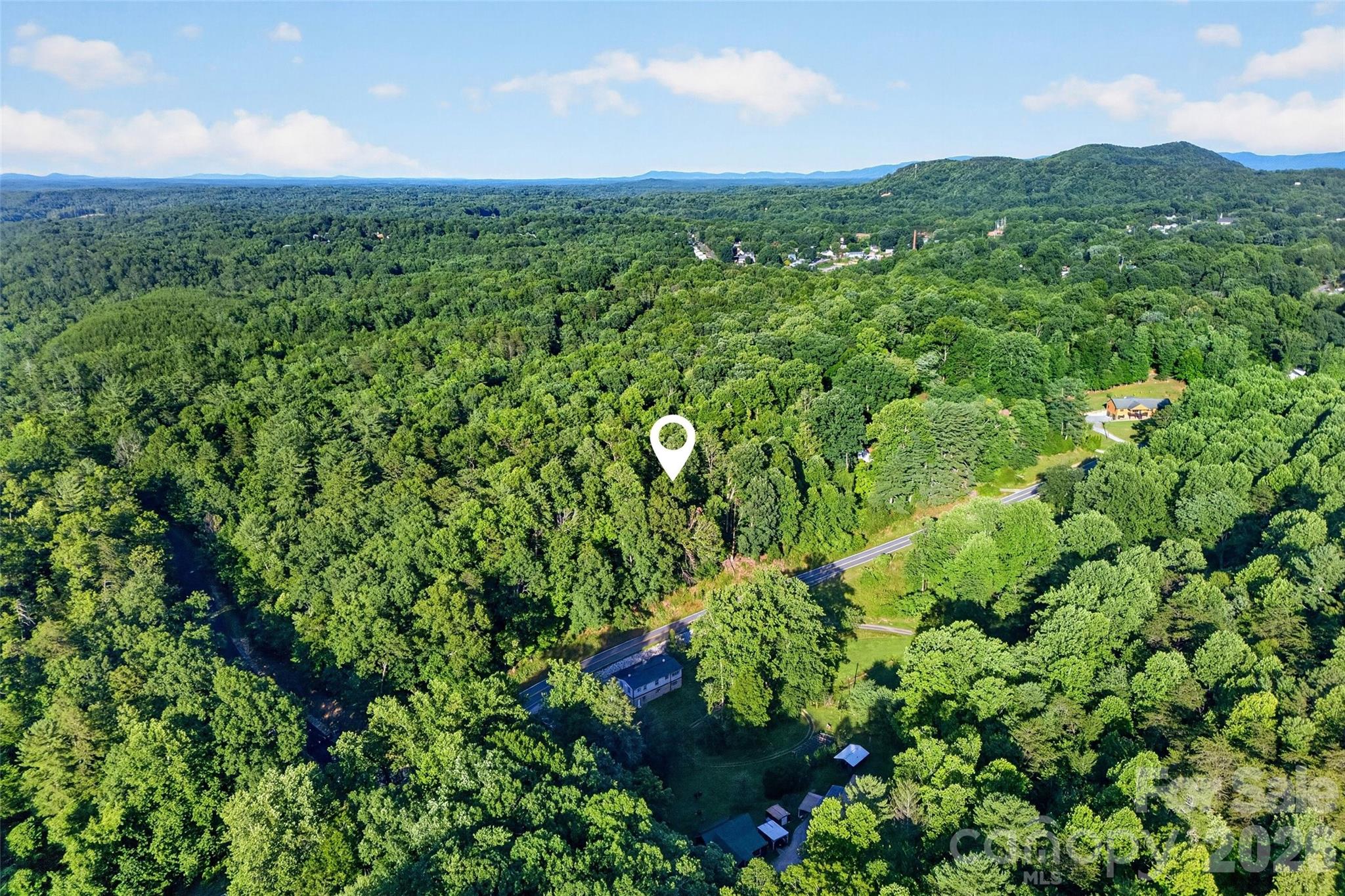 Motivated Seller!! 
This 4.24 acres of unrestricted property is waiting for you to build your dream home. Located near town and having road frontage on Yancey Rd makes it easily accessible and a great opportunity. The property borders the Lakewood community and is approximately 13 miles Lake James beach/Paddys creek area.
More Pictures to come!