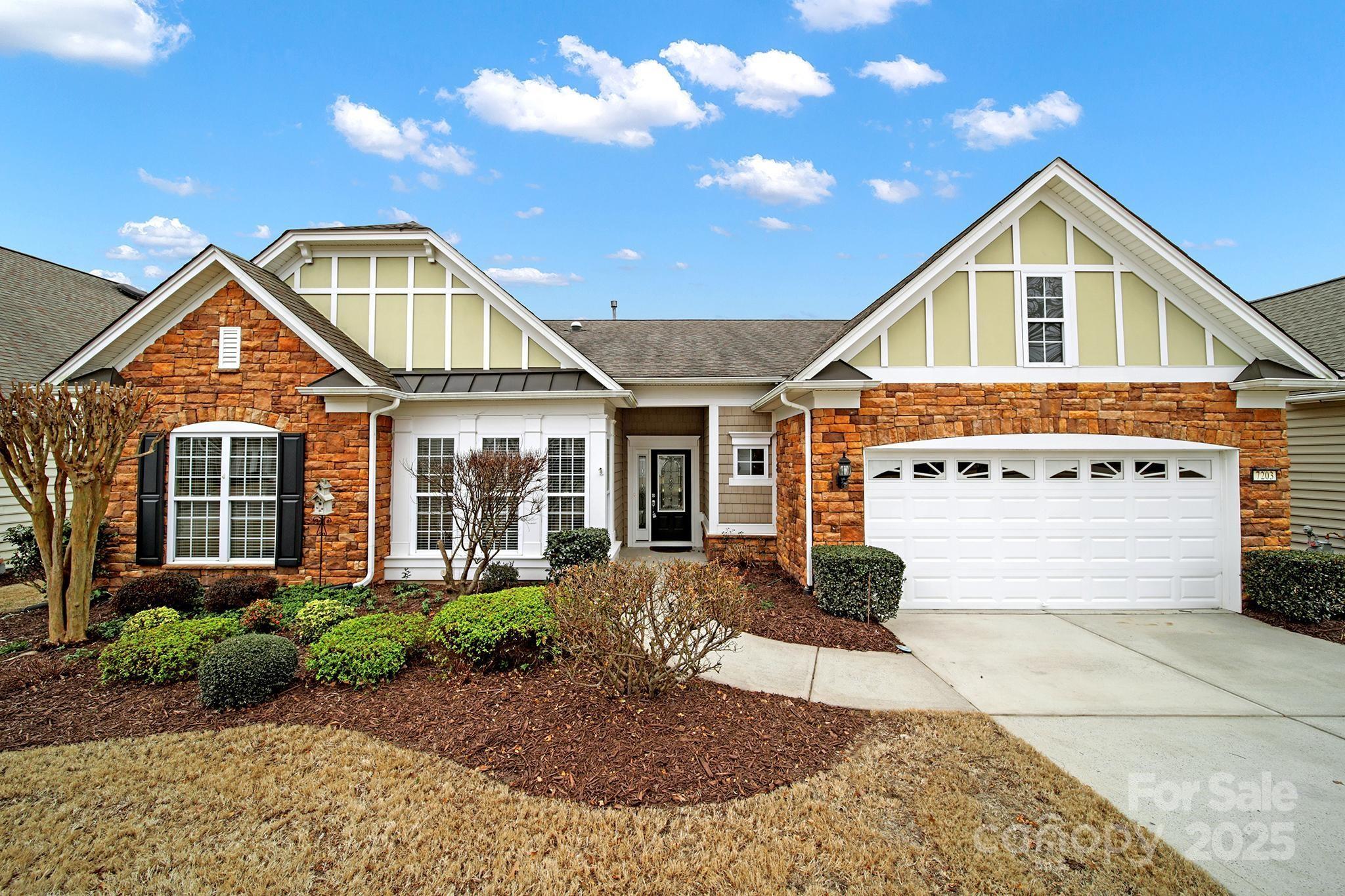 Move-in ready Crestwood Meadow in amenity-rich Sun City! Pre-finished wood flooring flows through the main living areas, w/ the comfort of carpet in the bdrms! Cook meals in the gourmet kitchen featuring SS appliances, granite counters, a gas cooktop, an island w/ bar seating, a built-in desk area, a pantry w/ a frosted glass door, & a breakfast nook! Get cozy around the gas fireplace of the great room in the winter, & host family & friends in the formal dining room! The primary suite has windows overlooking the backyard, and the en-suite bathroom has a soaking tub, glass enclosed shower, & a large walk-in closet. 2 guest bdrms, a hall bath, & an office w/ French doors sit in the front of the home. The stunning 3-season room boasts a wood ceiling, ceiling fan, recessed lighting, & tile flooring. A sliding door leads out onto the rear patio and backyard, lined with manicured landscaping! The extended 2-car garage offers extra space for a work area or storage! Come see this home today!