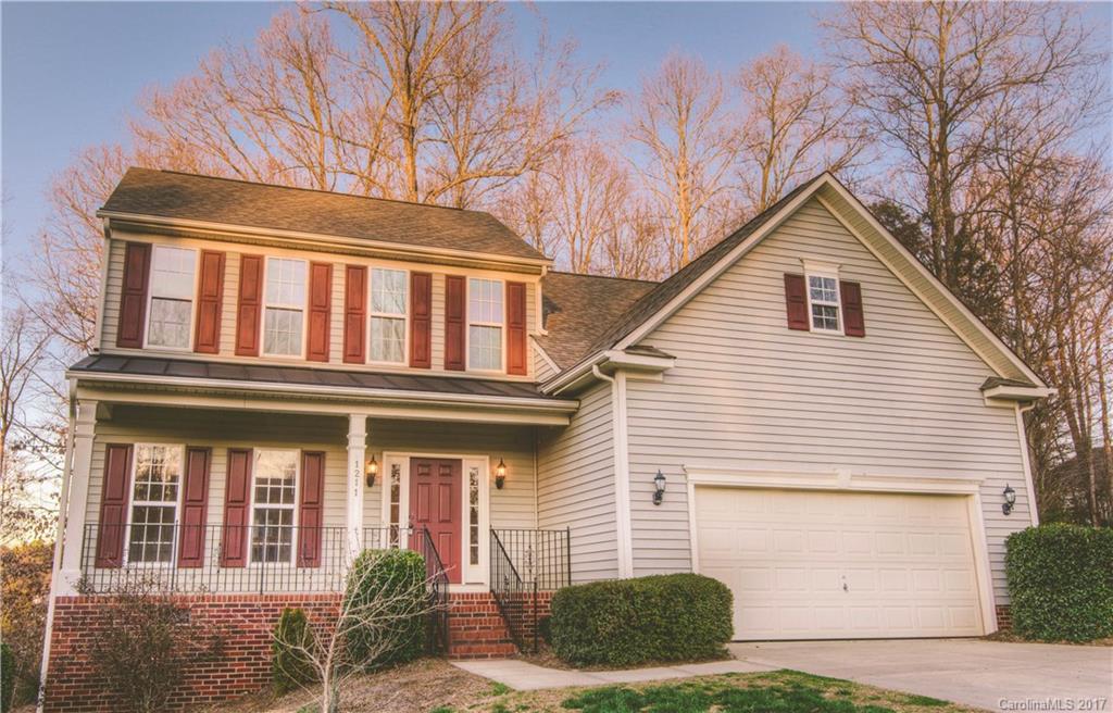 Sunset Pointe Cul-de-Sac Home - Walking Distance to Lake Wylie! This Beautiful Home Features a Spacious Owner’s Suite Downstairs, and Two Oversized Bedrooms & Loft Upstairs. Open Floorplan perfect for Entertaining! Large Great Room with Vaulted Ceiling and Fireplace. Brand New Carpet! Brand New Paint! Tons of Storage in the Extra Tall Crawl Space!  Community Features a Beach, Pool, and Boat Storage.  Relax in the Bright and Cheery Sunroom on this Private Wooded Homesite with a Great Backyard!