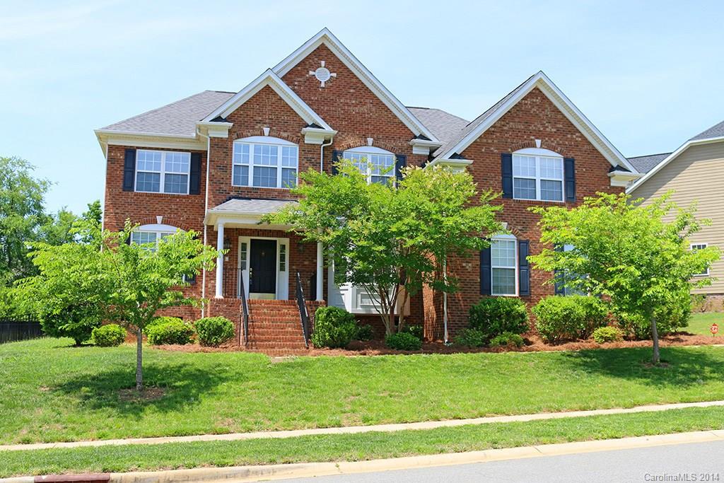Features brand new carpet & padding along with new paint throughout.Kitchen & bath updated with 18" sq tiles. Full bed/bath on main.Large kitchen w/ pull out rolling shelves, flat island & Corian tops.Work station.Dining is HUGE w bay window,wainscoting & crown moldings.Open floor plan w large living room & great room w 2 story ceiling.Blinds throughout.Hardwood floors in 2 bedrooms upstairs.Great for those with allergies!MB has huge separate sitting area & 2 closets.This home gets lots of natural light and has a great flow.Dual staircase.Black iron fenced lot in back with a yard big enough for a pool.
