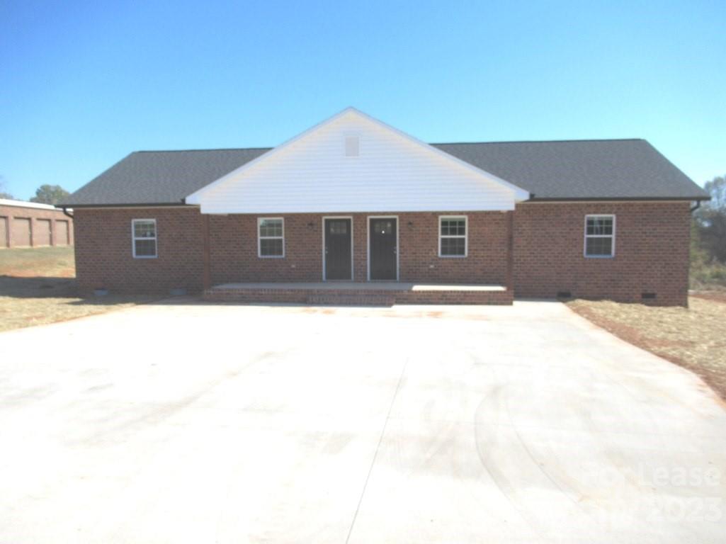Check out this new brick duplex conveniently located 10 minutes on the southwest side Lincolnton with almost 1000 square feet.  This one offer a large Den, nice kitchen with granite counters and all appliances.  Vinyl Plank Floors, ceiling fans, laundry room. Two good sized bedrooms and 1 bath.  Covered front porch & rear patio.  Located in a quiet neighborhood with large yard.  Application is required to be considered for lease.  Pets allowed are small breed only.